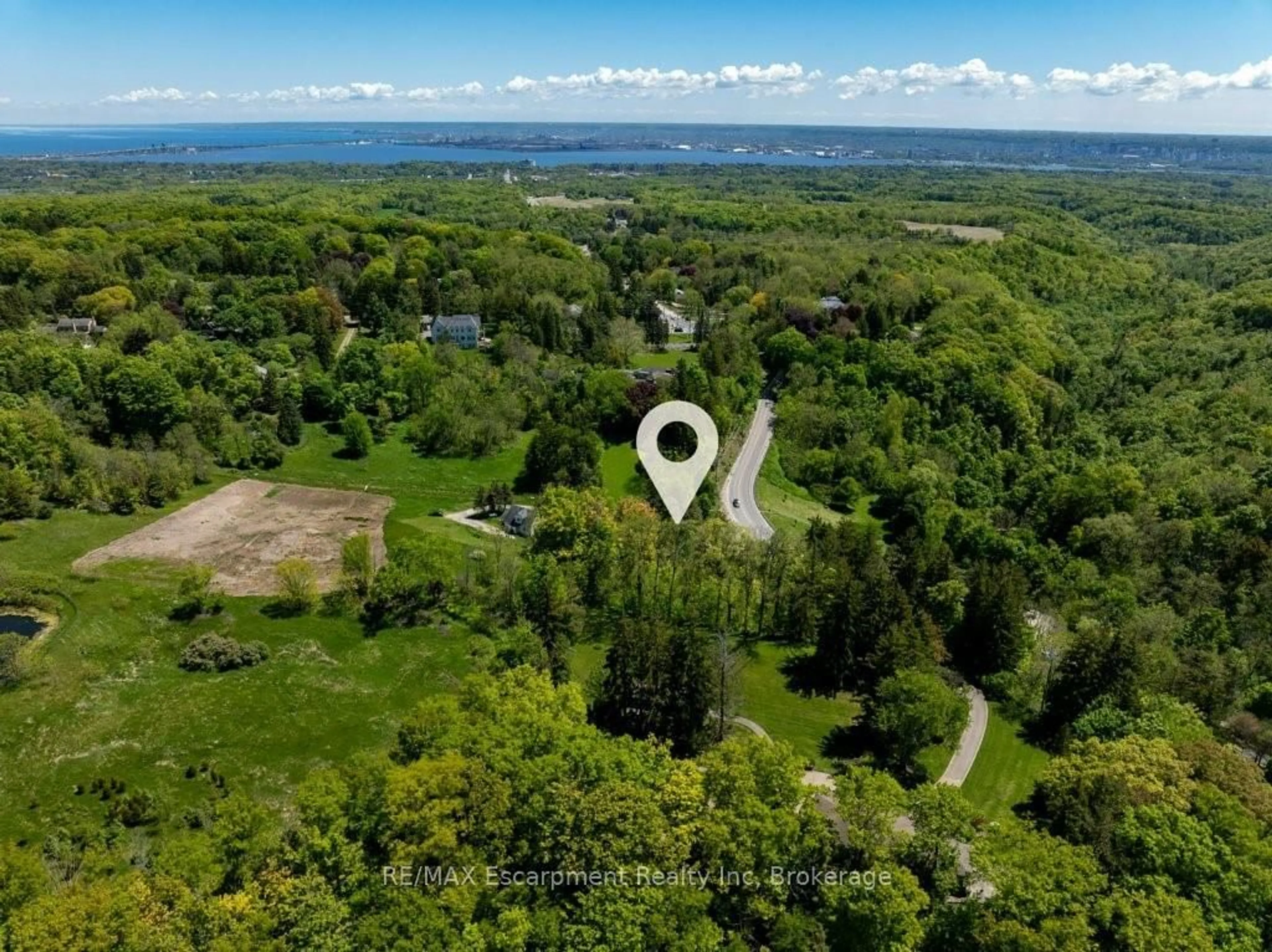 A pic from outside/outdoor area/front of a property/back of a property/a pic from drone, forest/trees view for 193 Mill St, Hamilton Ontario L0R 2H0