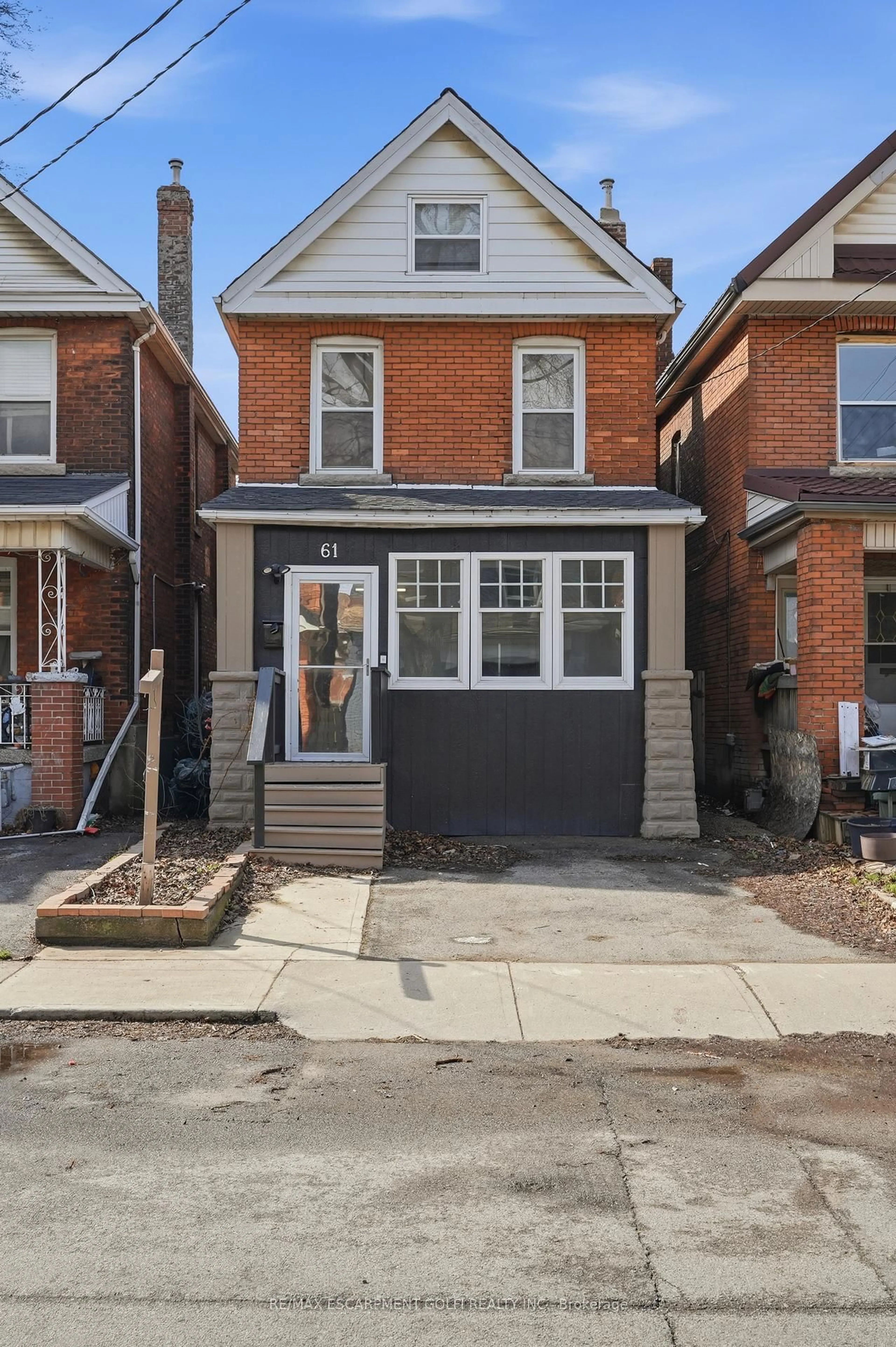 Home with brick exterior material, street for 61 Stirton St, Hamilton Ontario L8L 6E7