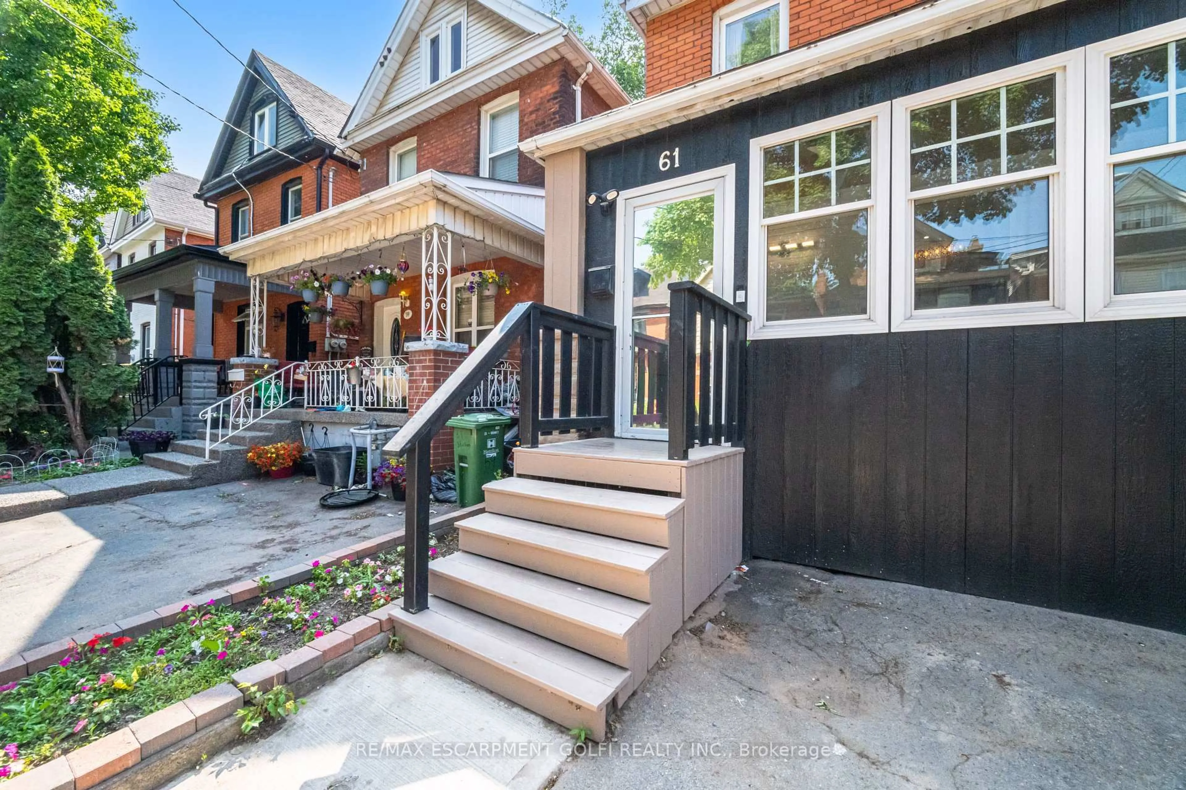 Home with brick exterior material, street for 61 Stirton St, Hamilton Ontario L8L 6E7