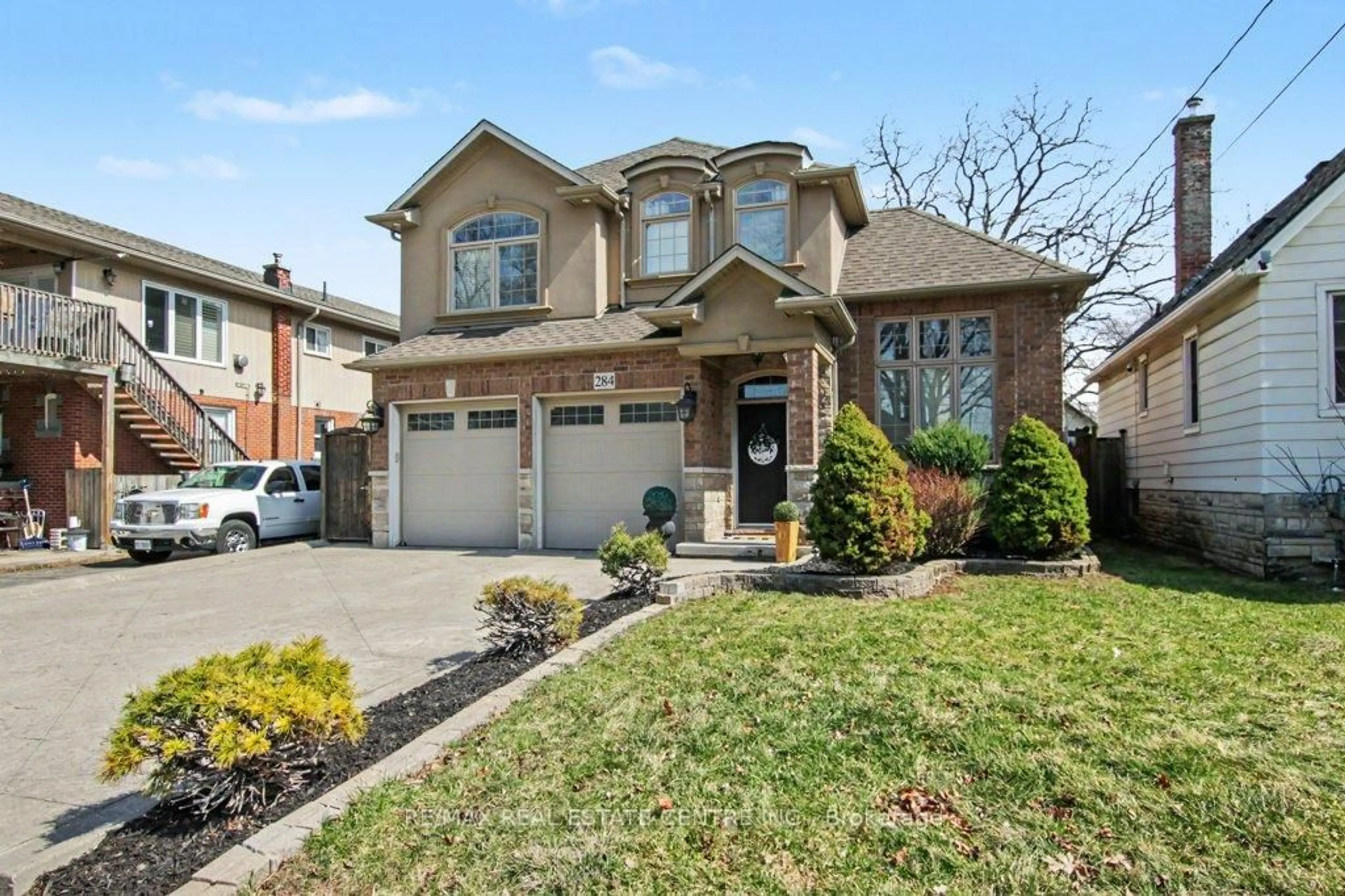 Home with brick exterior material, street for 284 Normanhurst Ave, Hamilton Ontario L8H 5N4