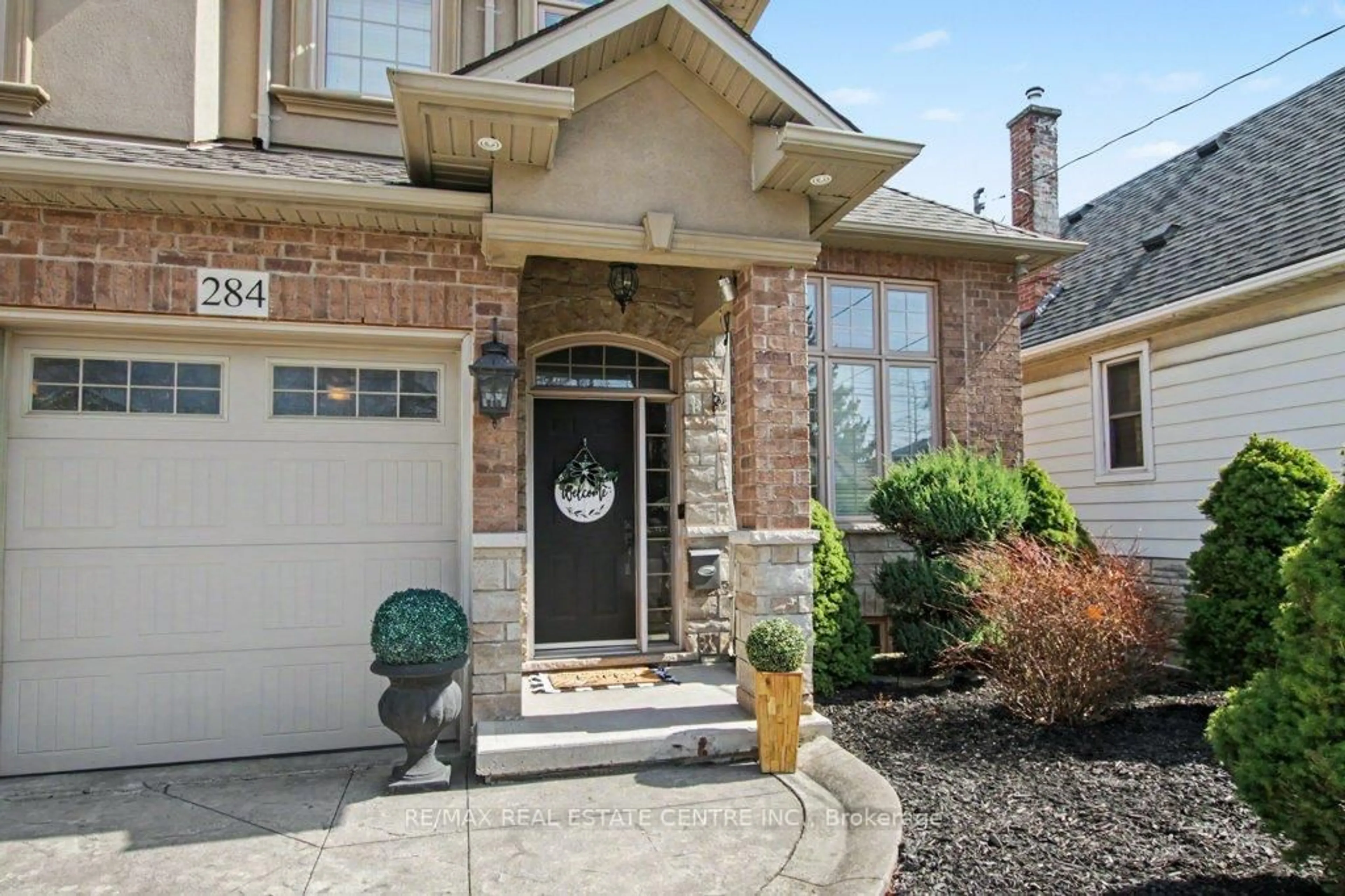 Home with brick exterior material, street for 284 Normanhurst Ave, Hamilton Ontario L8H 5N4