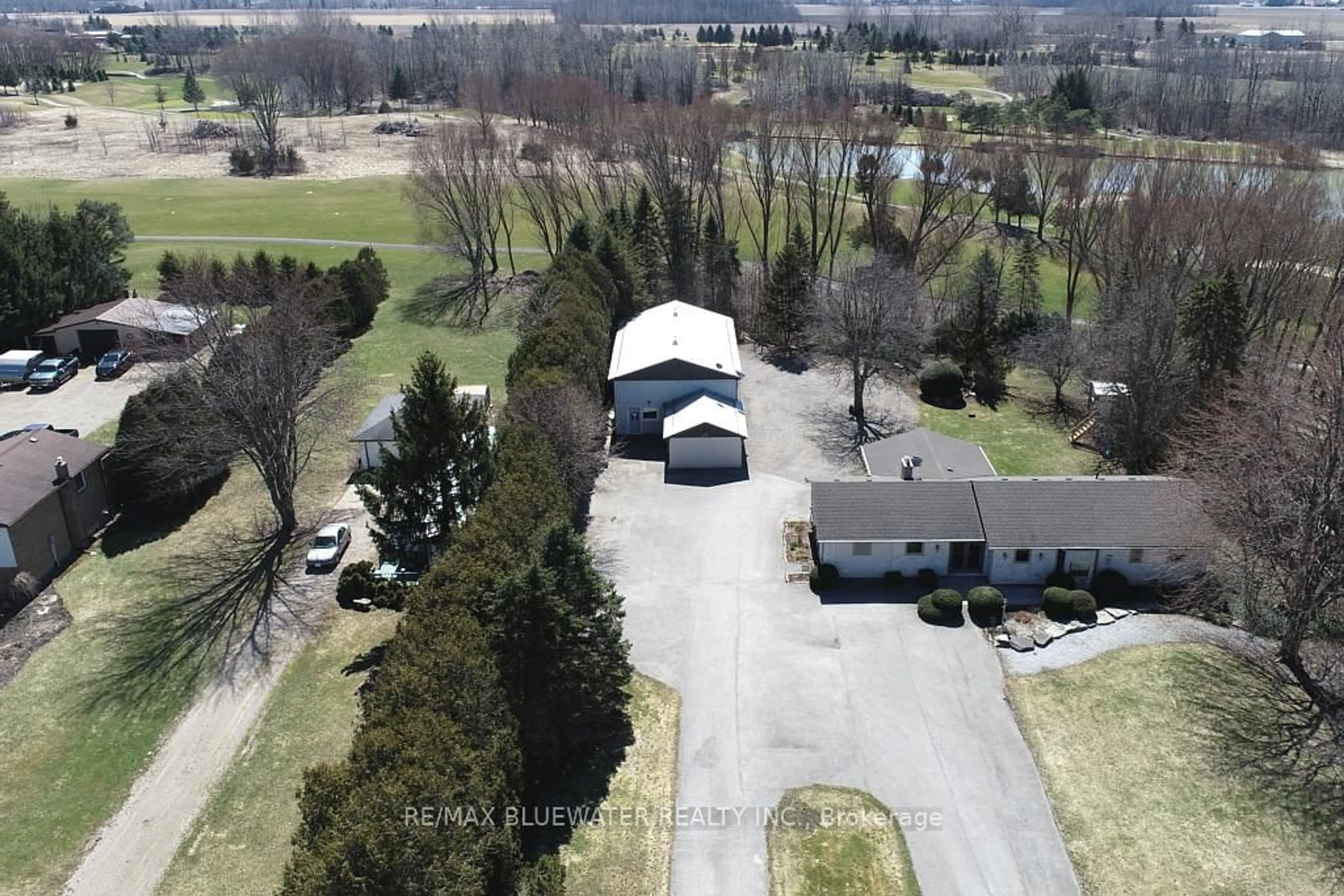 A pic from outside/outdoor area/front of a property/back of a property/a pic from drone, unknown for 283/279 Main St, Lambton Shores Ontario N0M 2N0