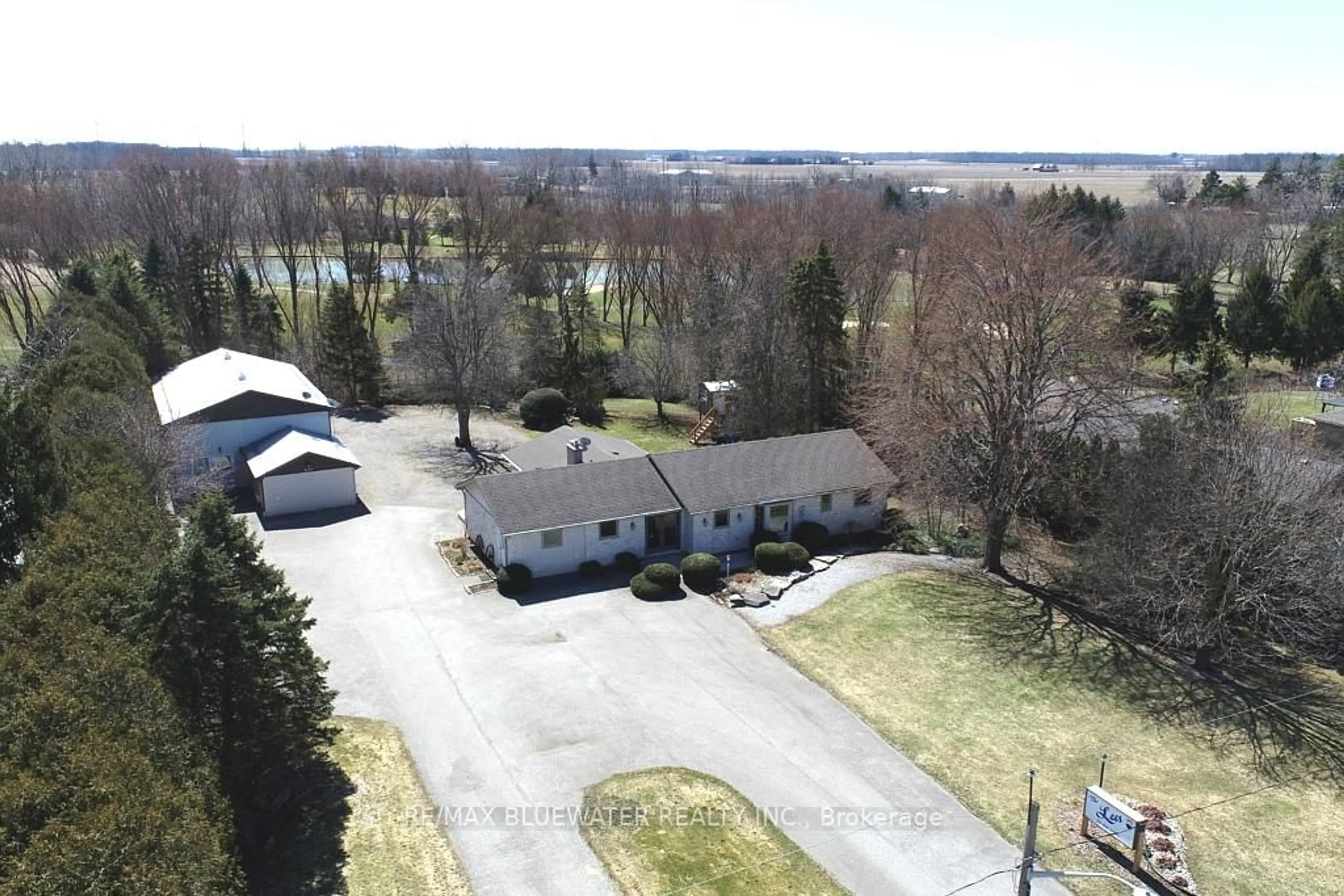 A pic from outside/outdoor area/front of a property/back of a property/a pic from drone, unknown for 283/279 Main St, Lambton Shores Ontario N0M 2N0