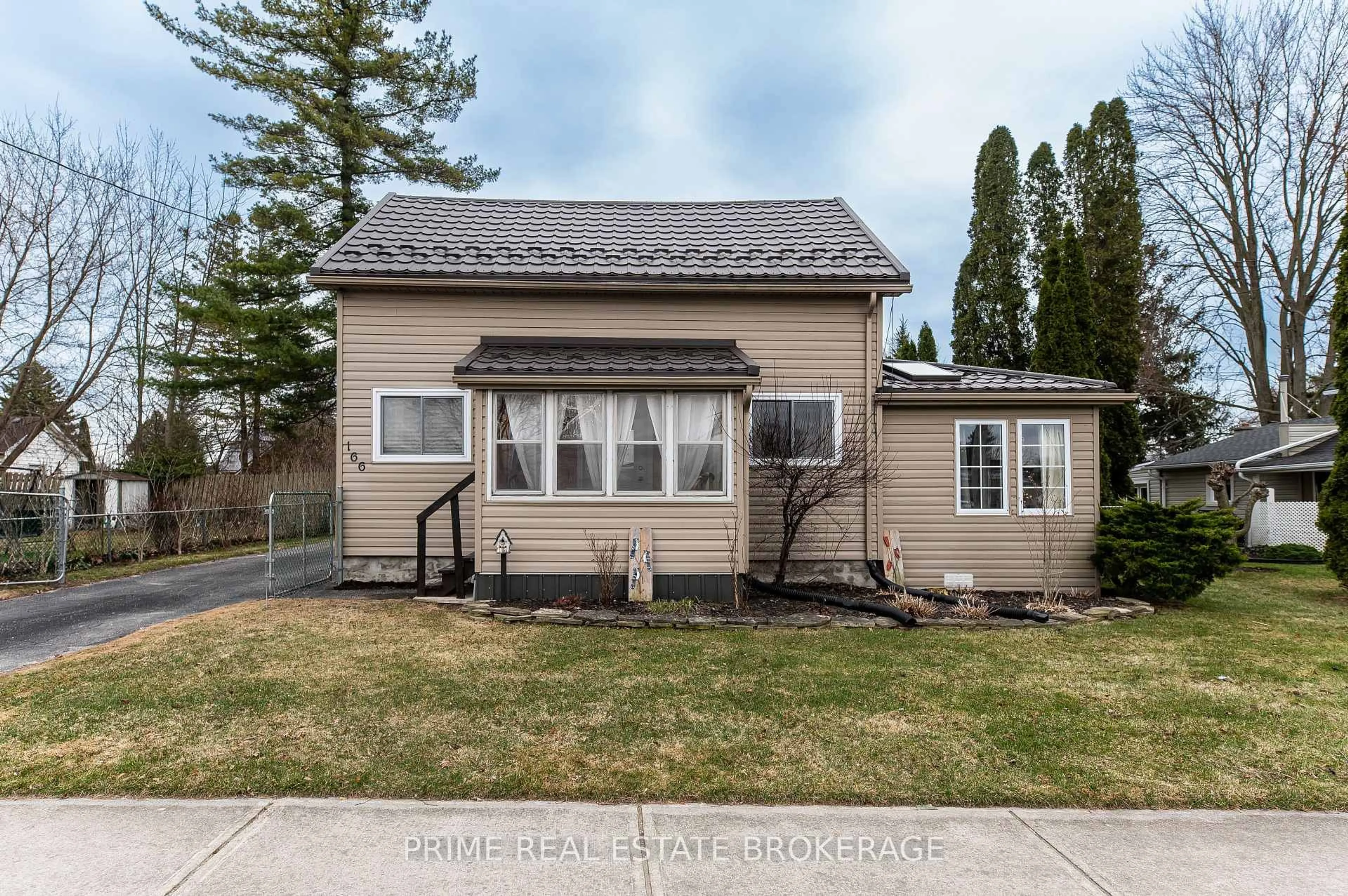 Home with vinyl exterior material, street for 166 Maple St, West Elgin Ontario N0L 2P0