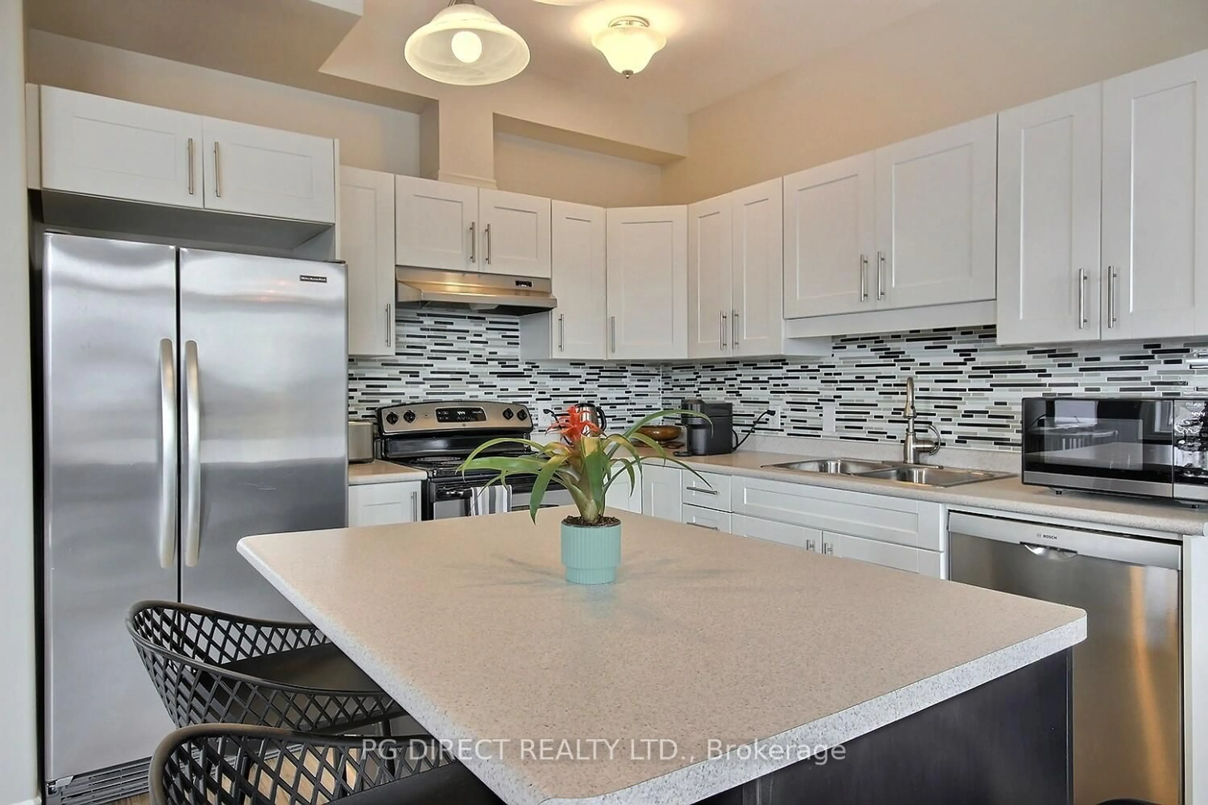 Open concept kitchen, ceramic/tile floor for 955 Blossom St, Kingston Ontario K7P 0N2