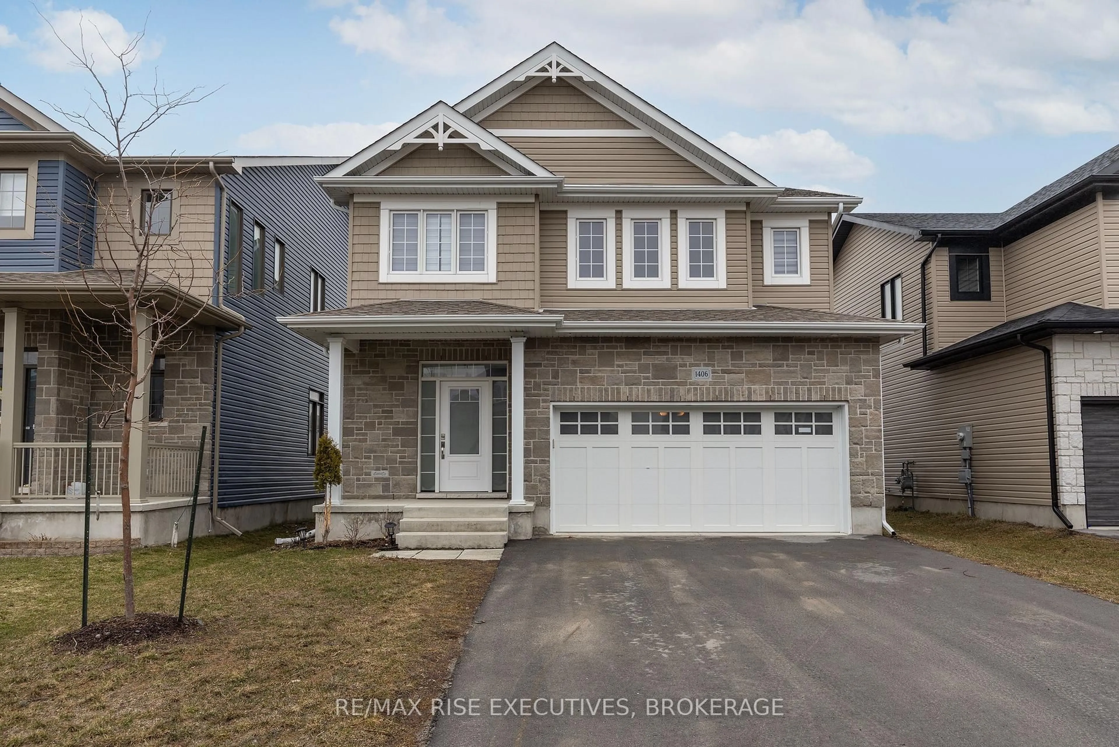 Home with vinyl exterior material, street for 1406 Tulip Dr, Kingston Ontario K7P 0S4