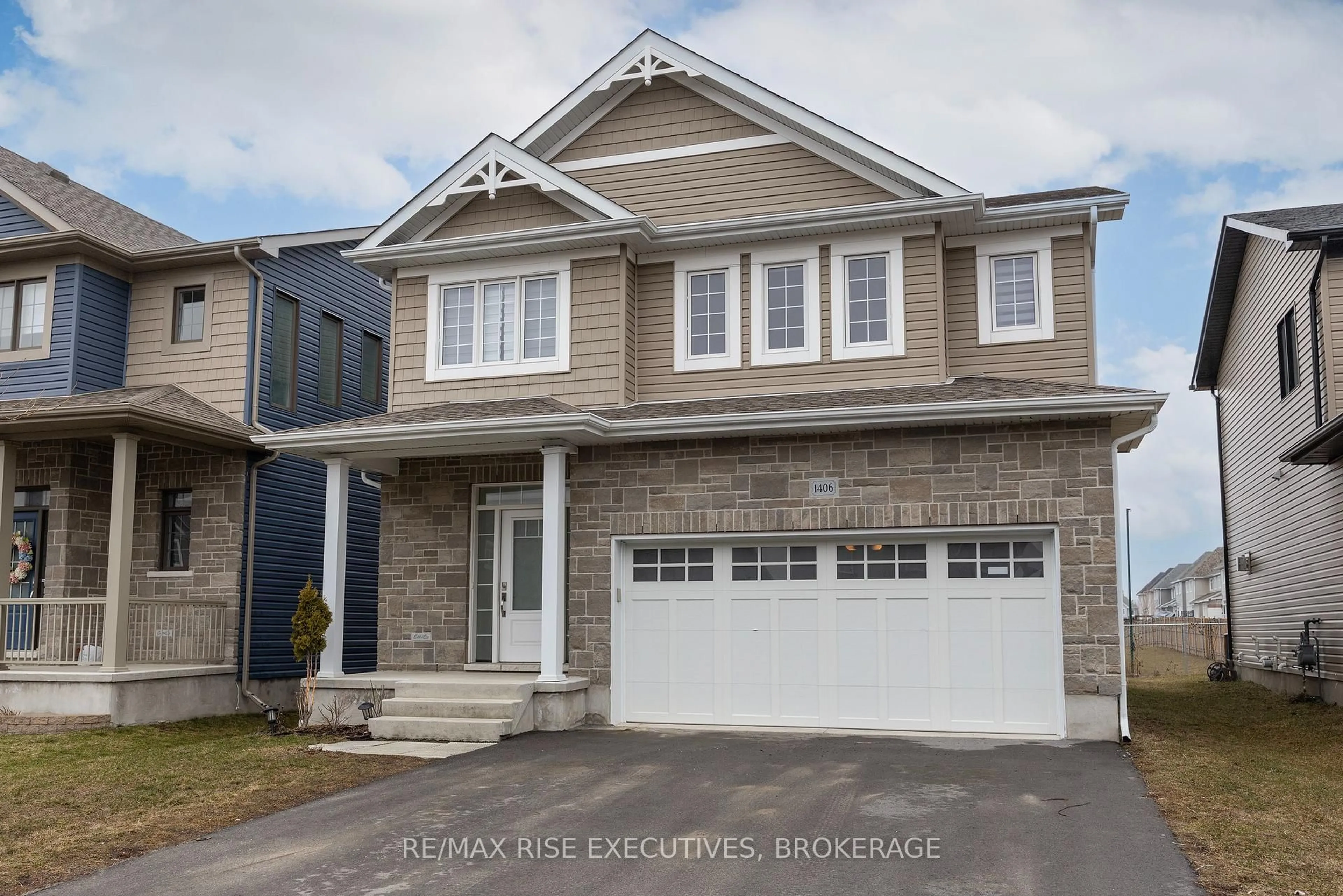 Home with vinyl exterior material, street for 1406 Tulip Dr, Kingston Ontario K7P 0S4