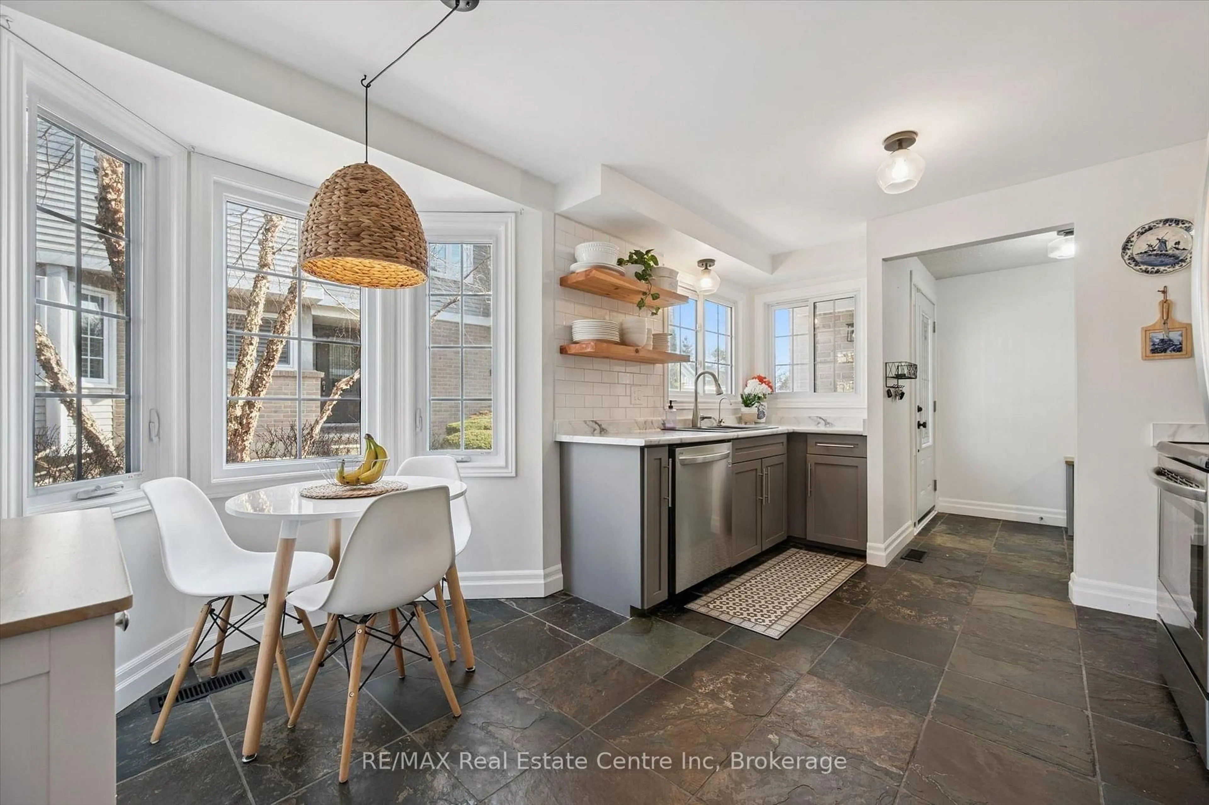 Open concept kitchen, ceramic/tile floor for 106 WOODLAWN Rd #3, Guelph Ontario N1E 1B7