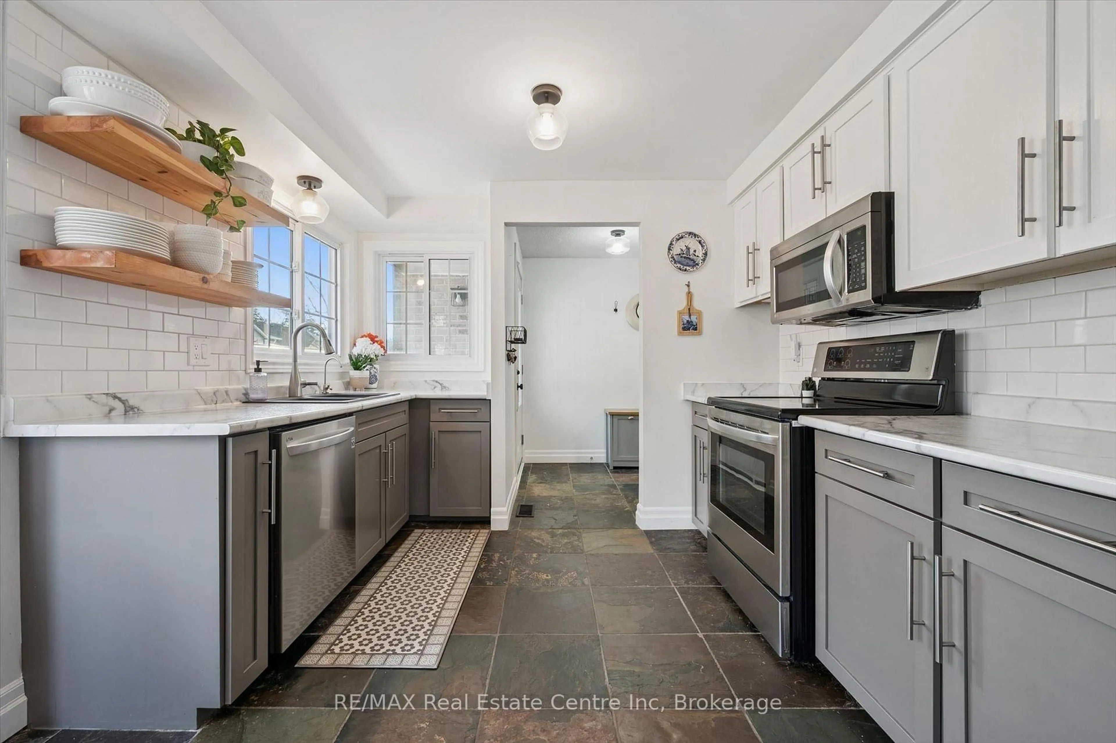 Open concept kitchen, ceramic/tile floor for 106 WOODLAWN Rd #3, Guelph Ontario N1E 1B7