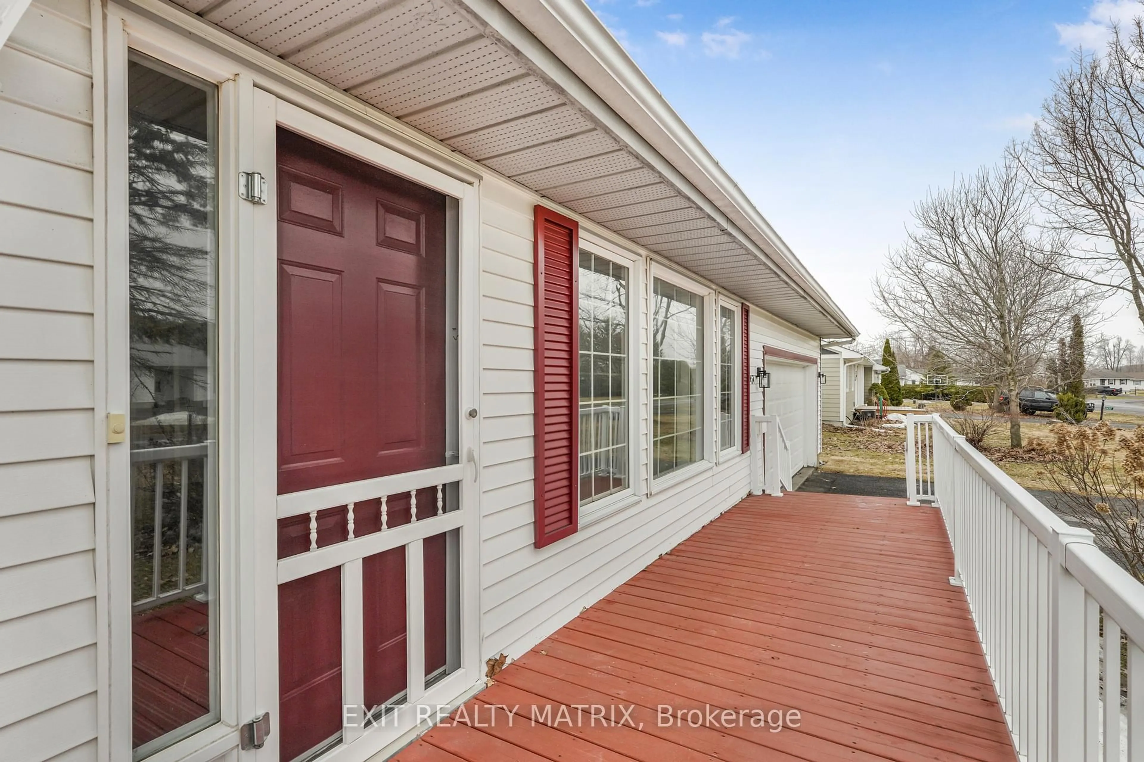 Home with vinyl exterior material, street for 6454 Waterbury Lane, North Gower Ontario K0A 2T0