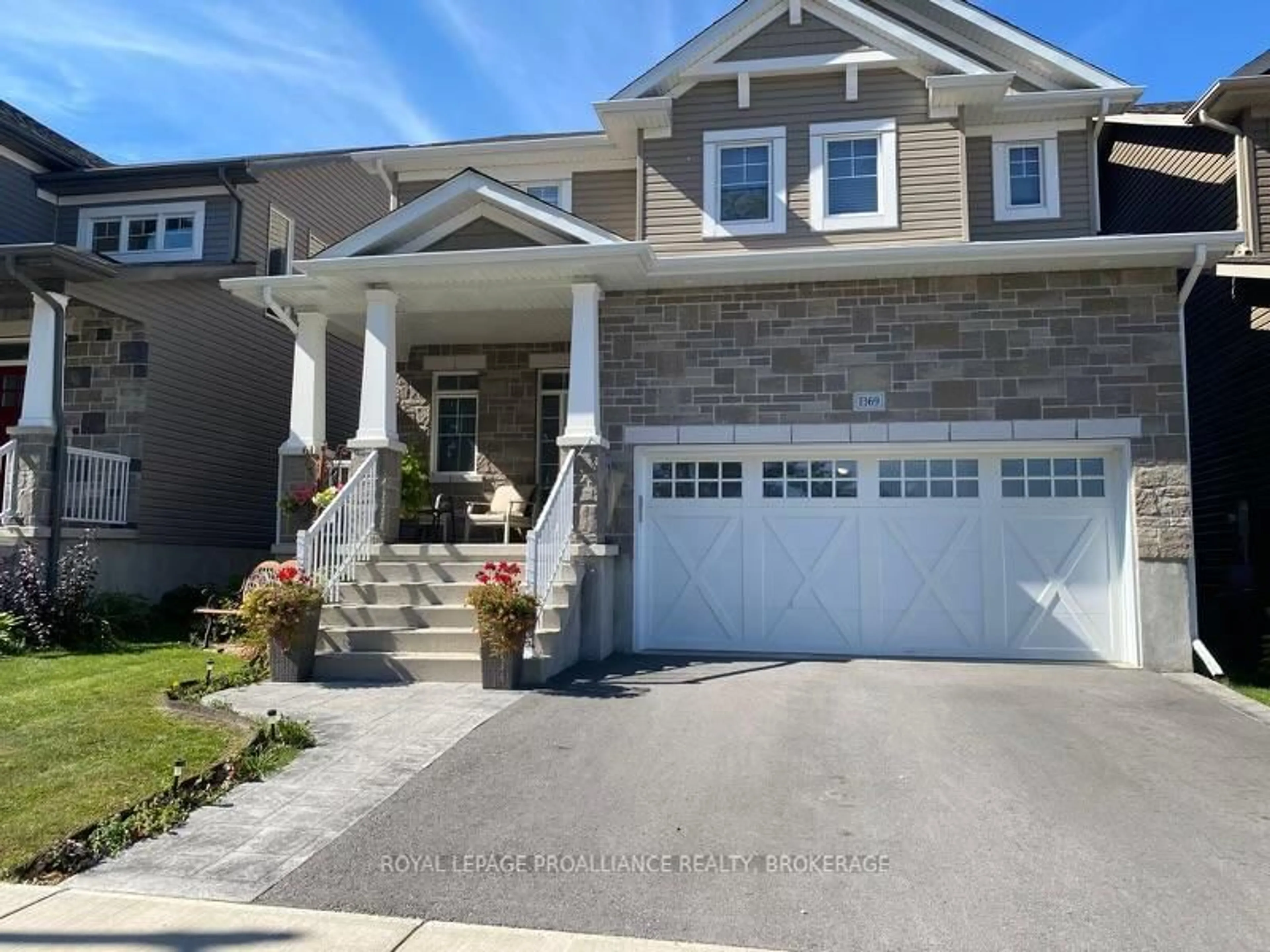 Home with vinyl exterior material, street for 1369 Andersen Dr, Kingston Ontario K7P 0P5