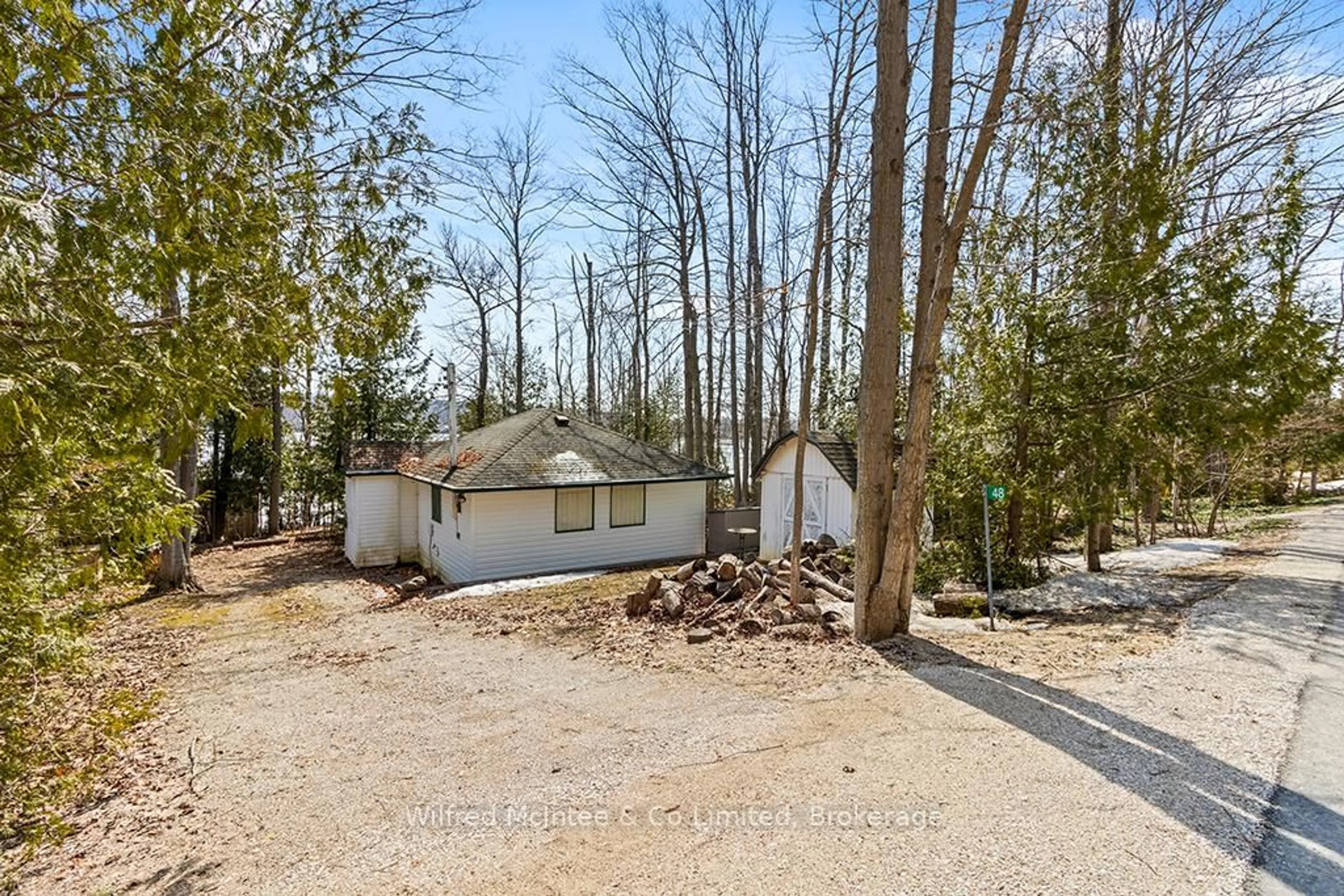 A pic from outside/outdoor area/front of a property/back of a property/a pic from drone, unknown for 48 MAPLE Dr, South Bruce Peninsula Ontario N0H 1A0