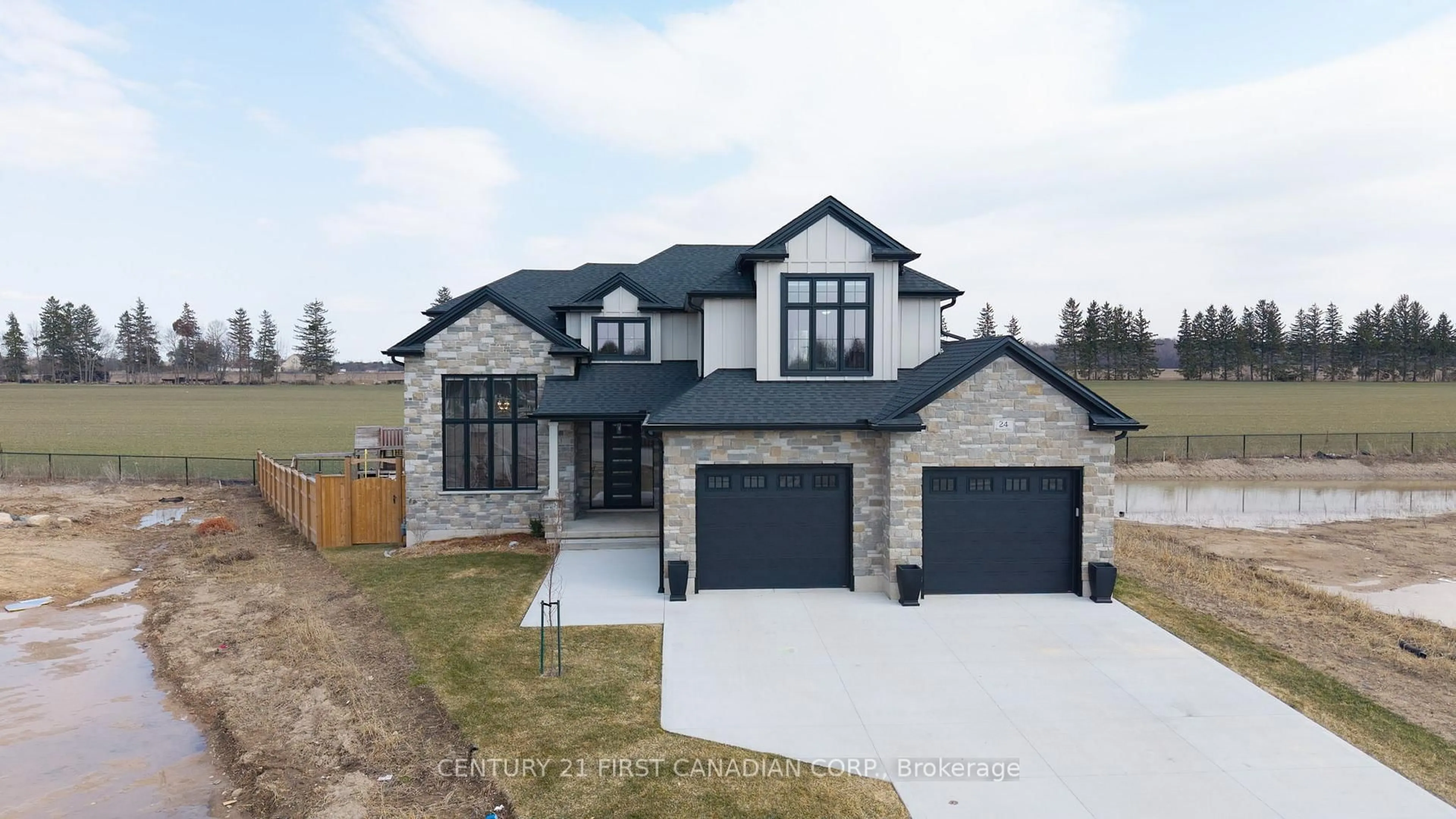 Home with brick exterior material, street for 24 Postma Cres, North Middlesex Ontario N0M 1A0