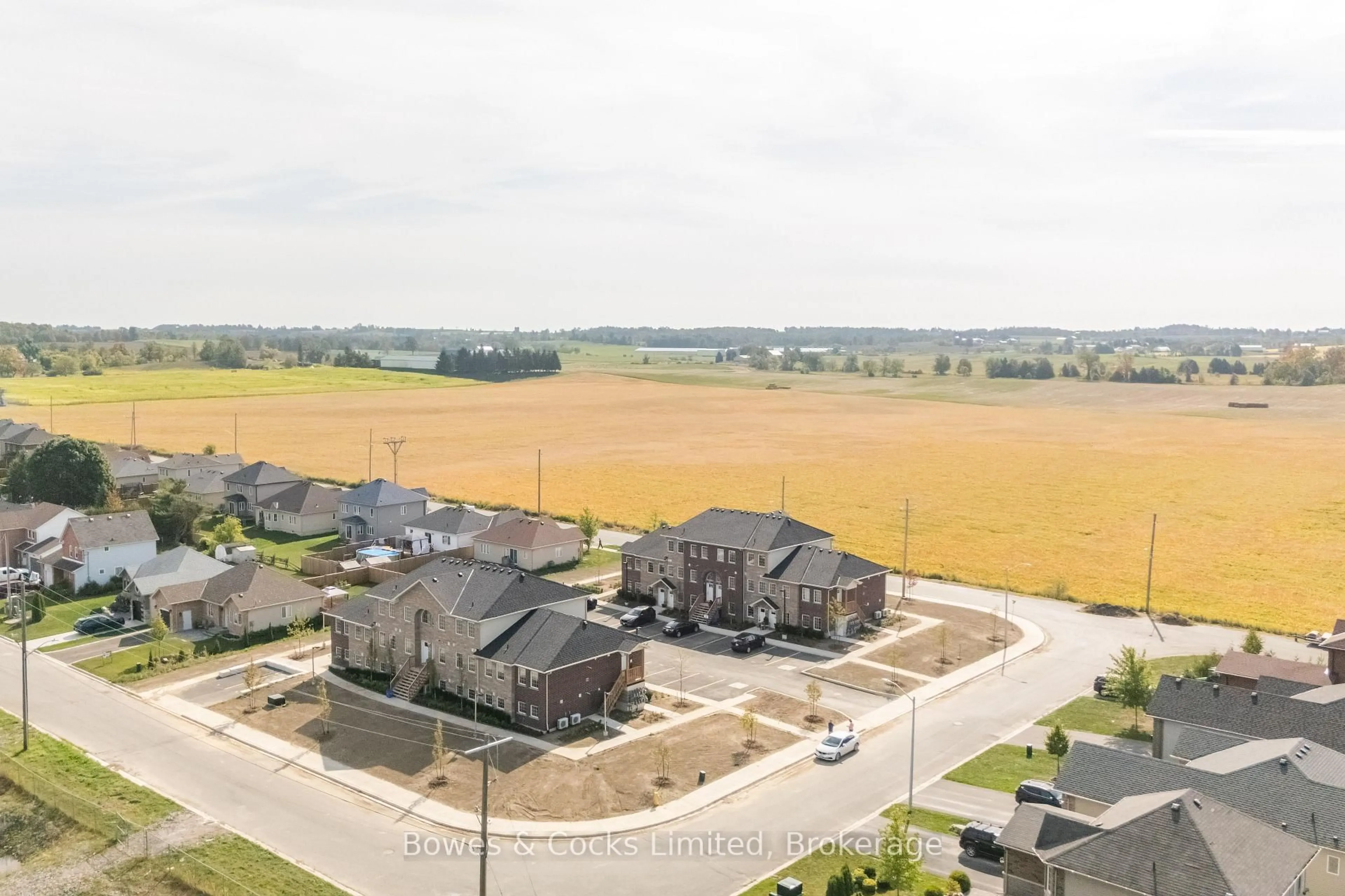 A pic from outside/outdoor area/front of a property/back of a property/a pic from drone, unknown for 48 Maple Ave #102, Asphodel-Norwood Ontario K0L 2V0
