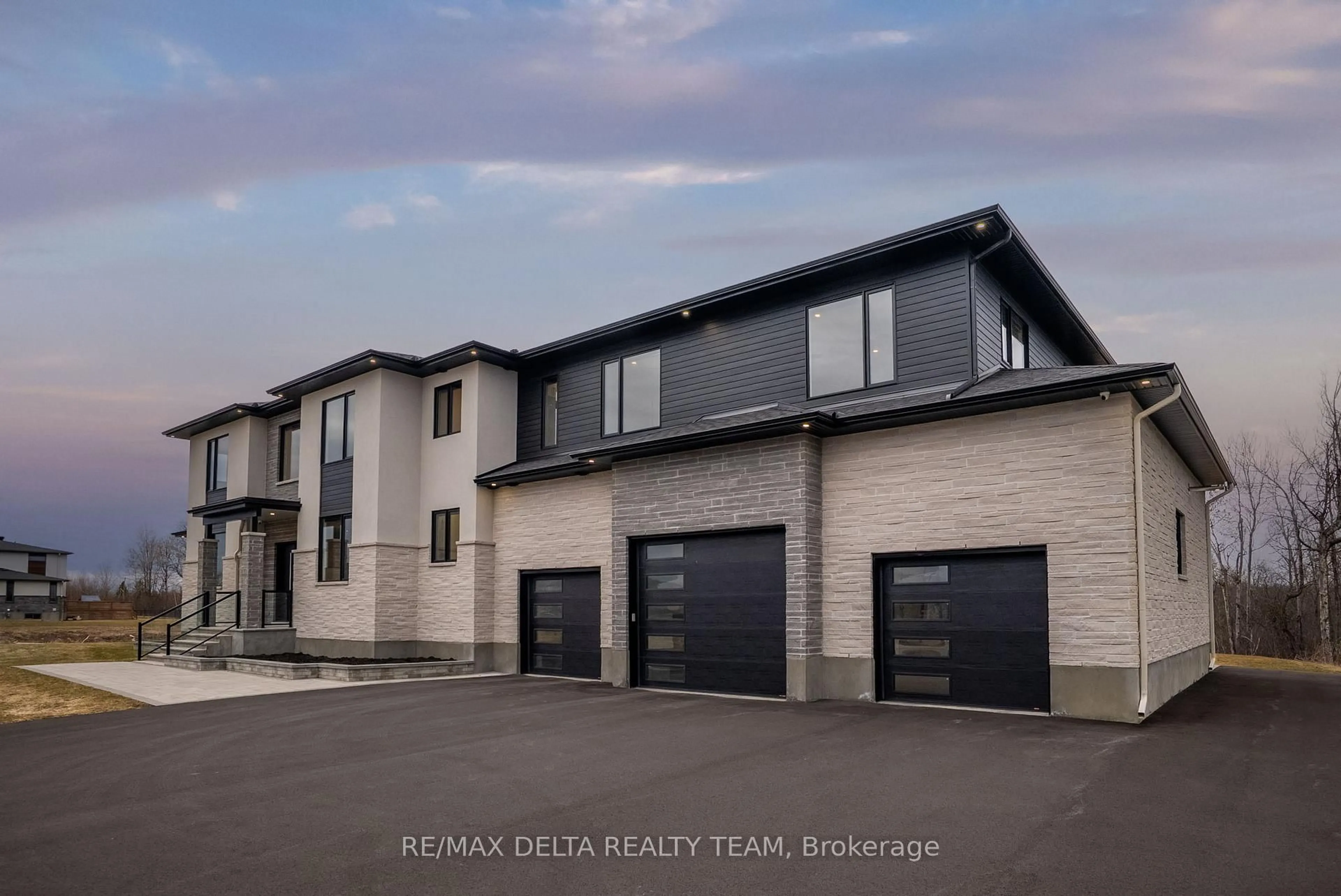 A pic from outside/outdoor area/front of a property/back of a property/a pic from drone, street for 663 Ballycastle Cres, Ottawa Ontario K1X 0A3