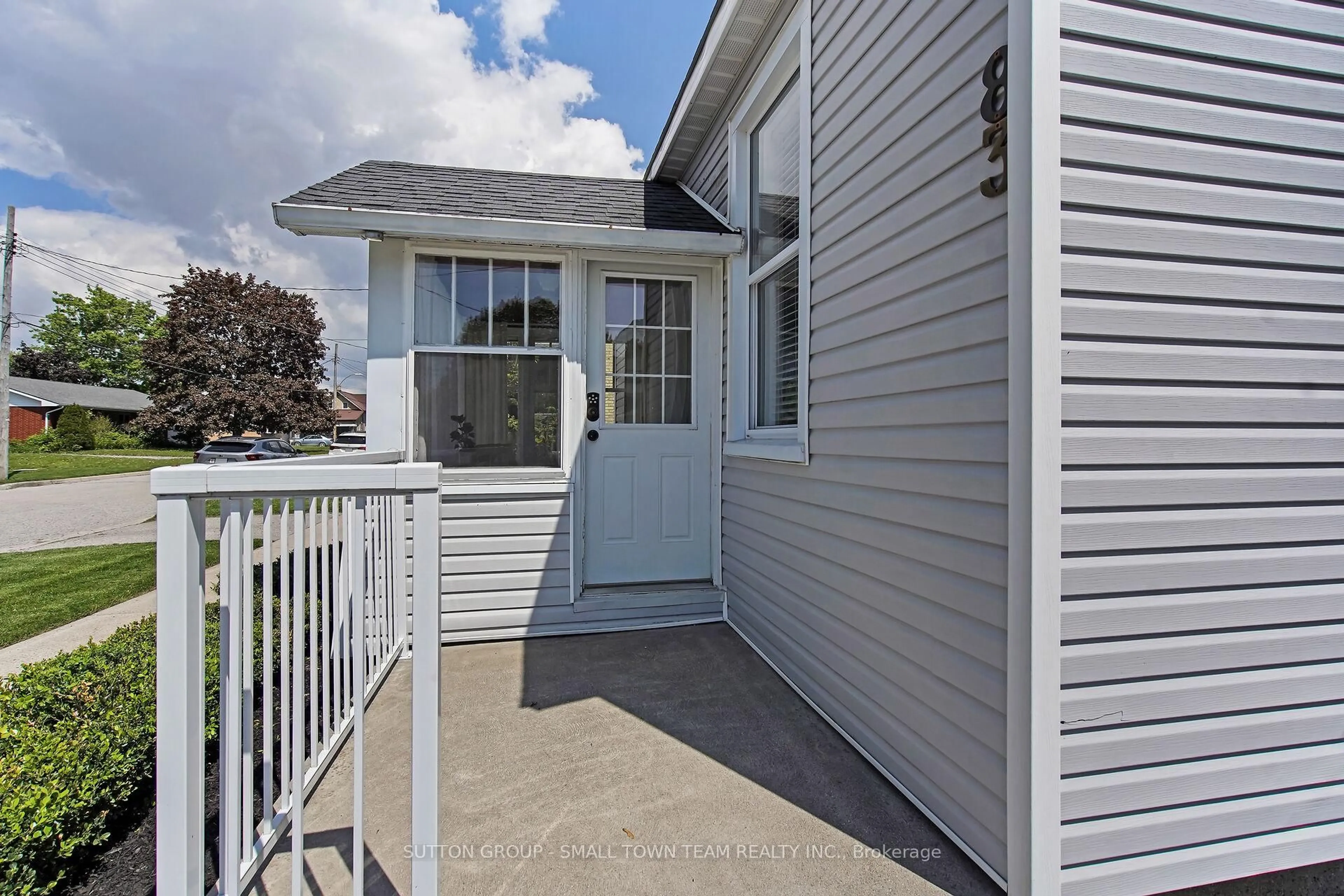 Home with vinyl exterior material, street for 83 John St, South Huron Ontario N0M 1S1