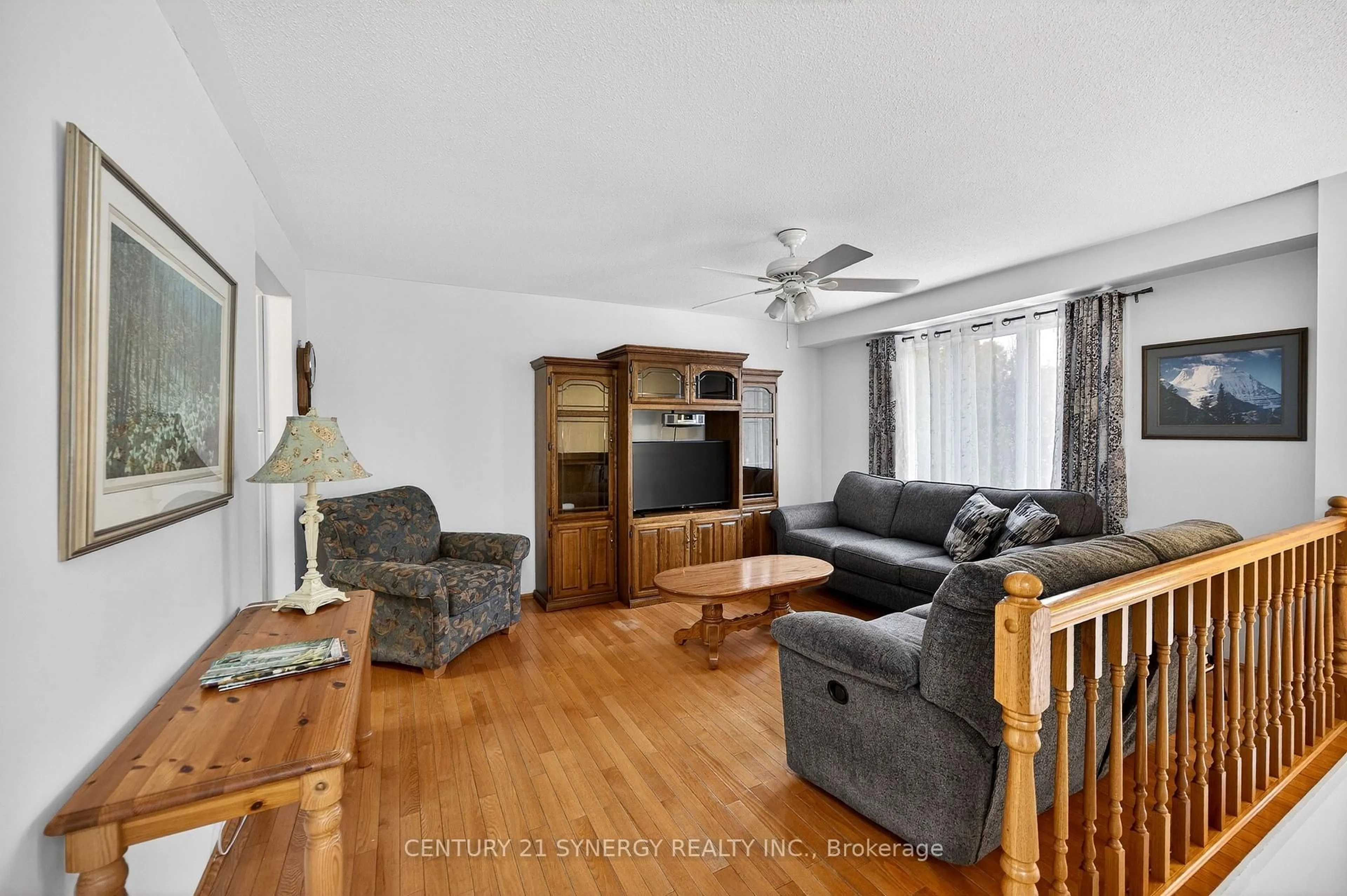 Living room with furniture, wood/laminate floor for 127 Snedden Dr, Almonte Ontario K0A 1A0