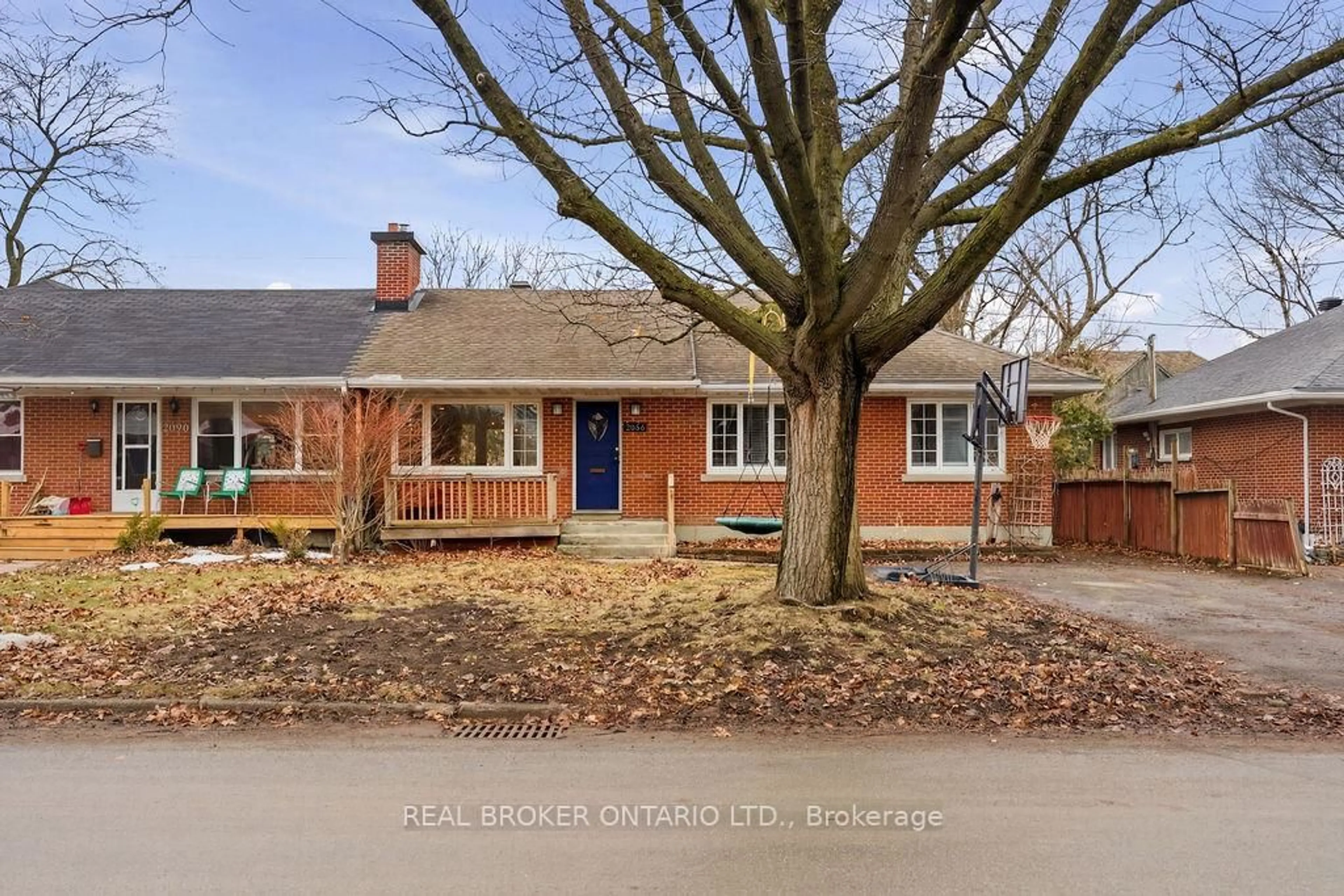 Home with brick exterior material, street for 2086 Blossom Dr, Ottawa Ontario K1H 6G8