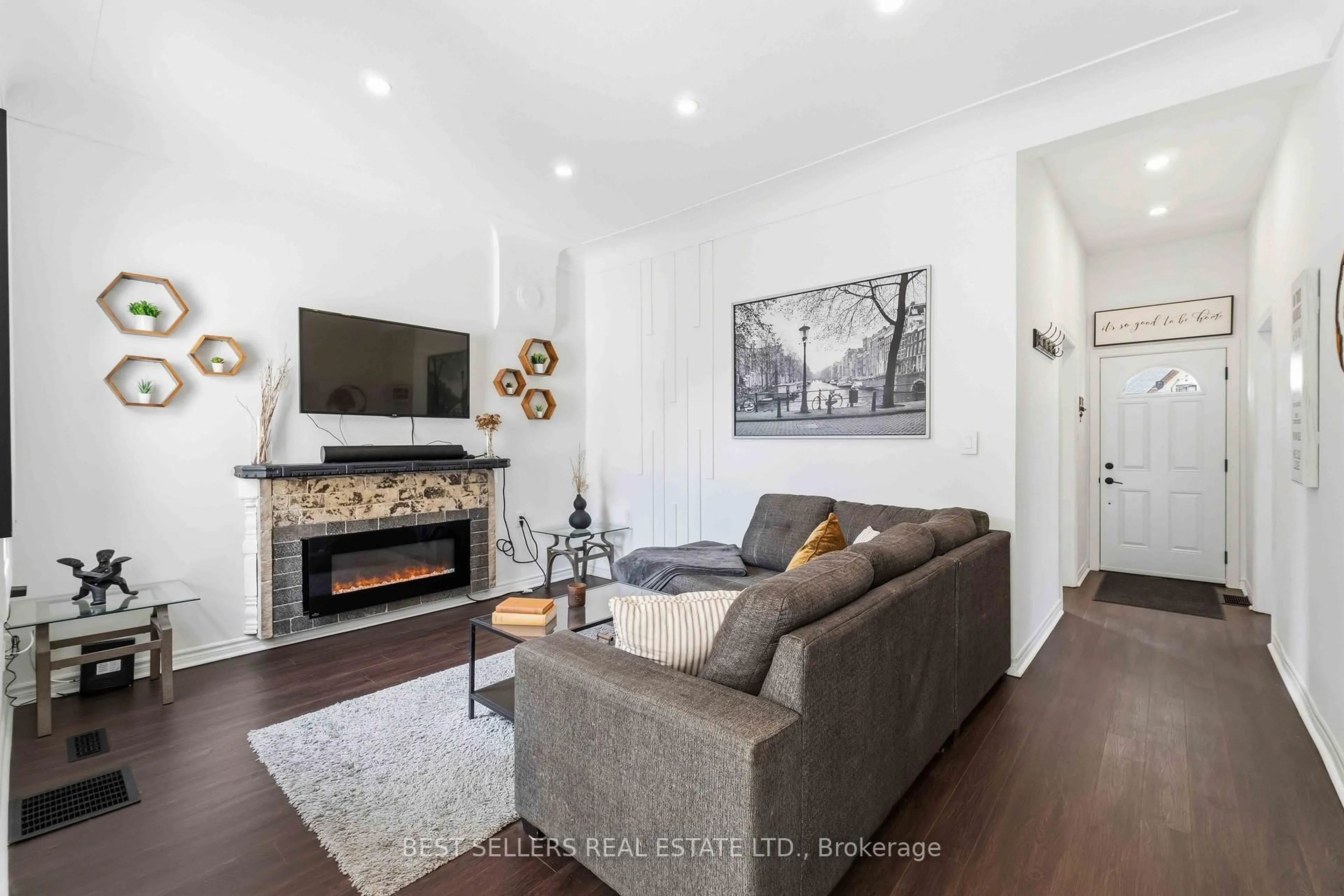 Living room with furniture, wood/laminate floor for 300 East Ave, Hamilton Ontario L8L 5J5