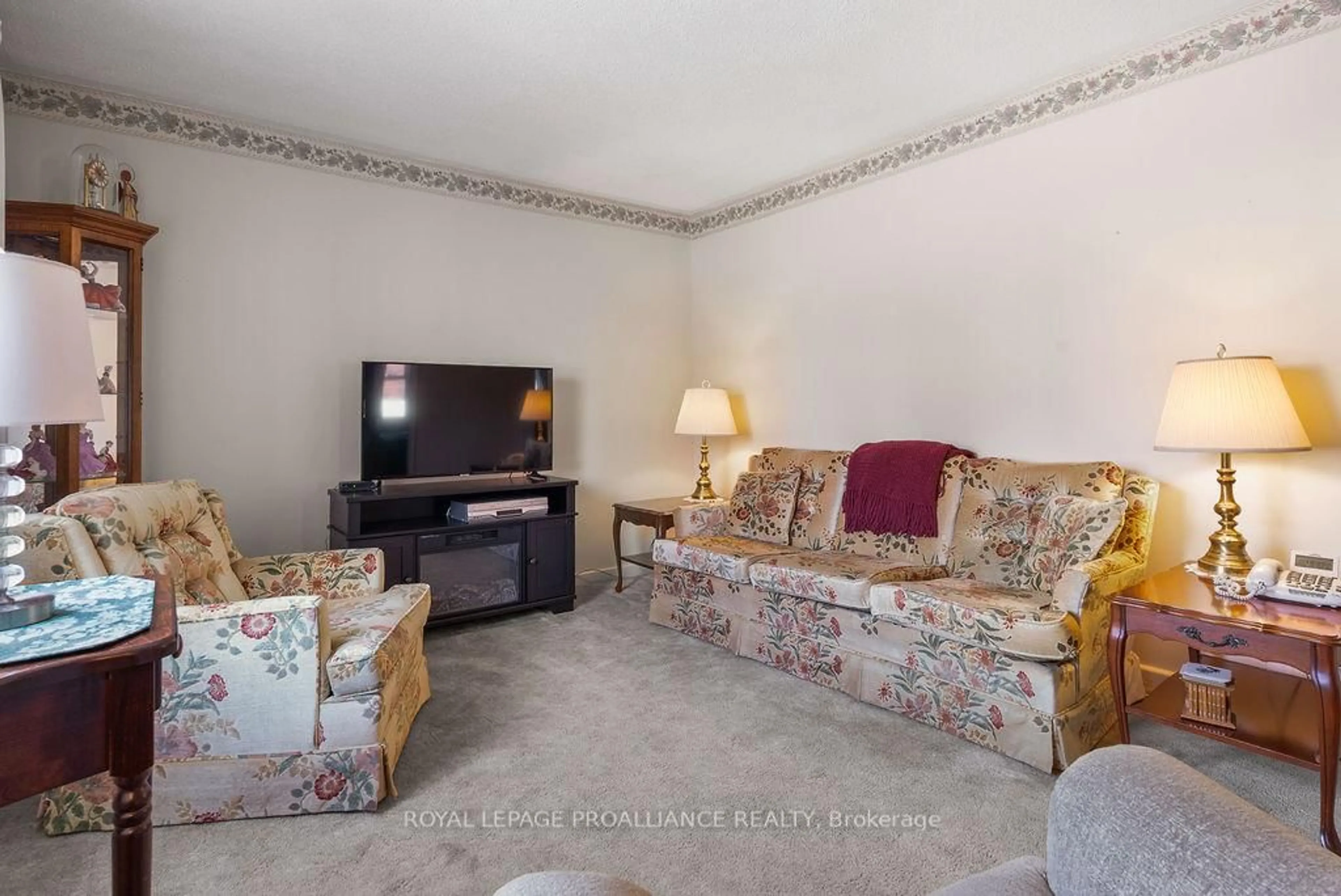 Living room with furniture, carpet floor for 19 Orchard Dr, Belleville Ontario K8P 2K2