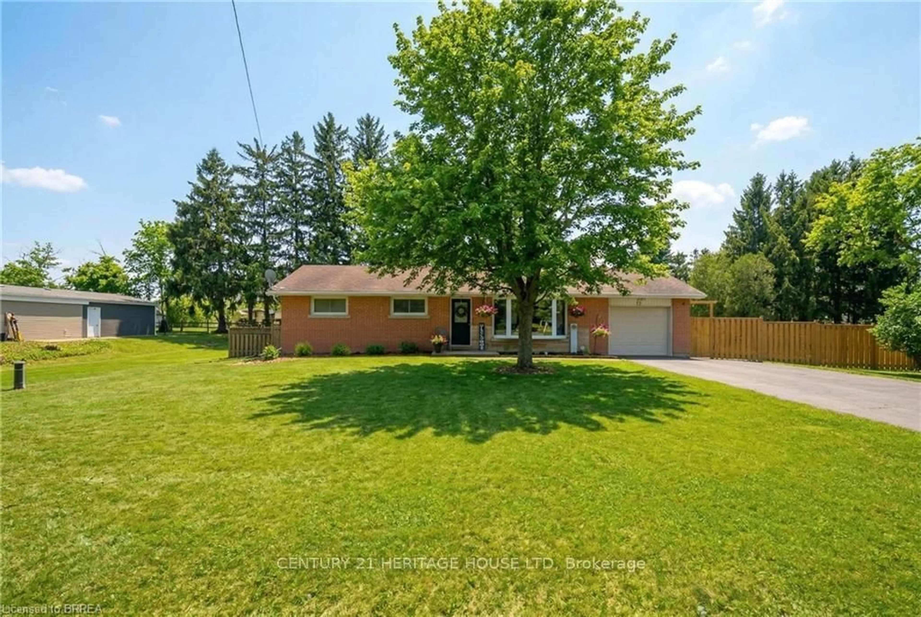 A pic from outside/outdoor area/front of a property/back of a property/a pic from drone, street for 12 Stewart Dr, Brant Ontario N0E 1A0