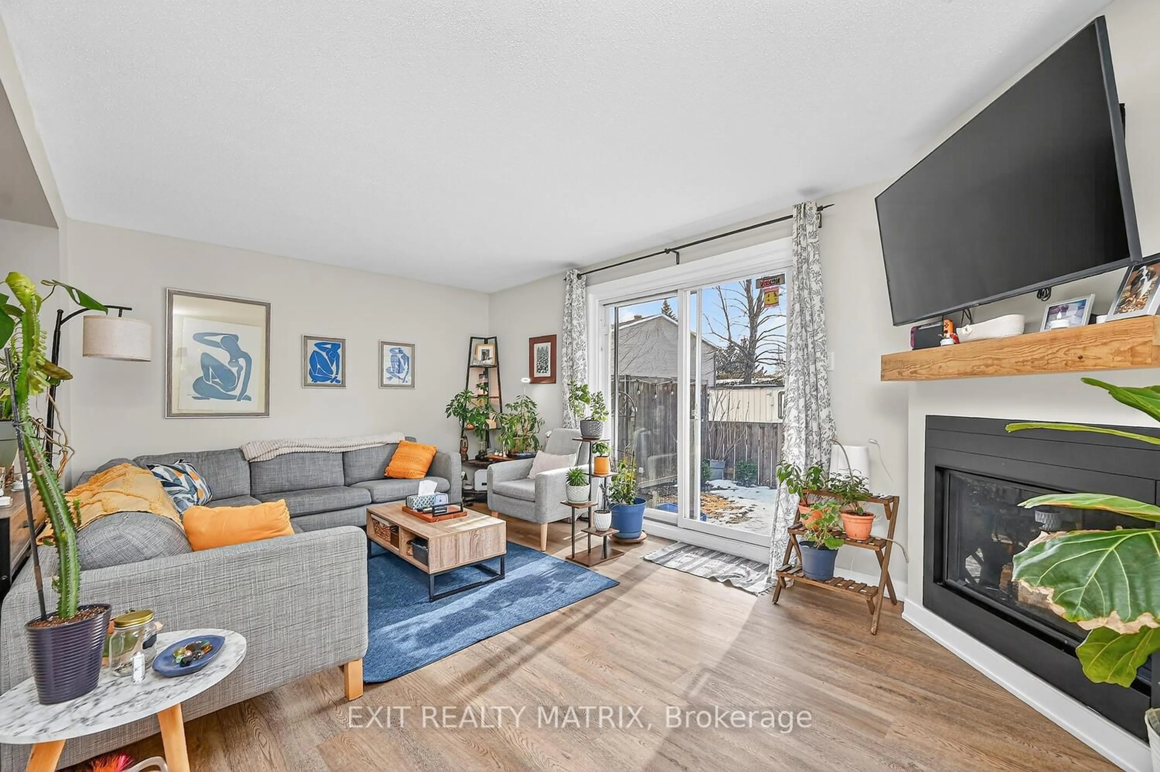 Living room with furniture, unknown for 1777 Lamoureux Dr #F, Ottawa Ontario K1E 2N5