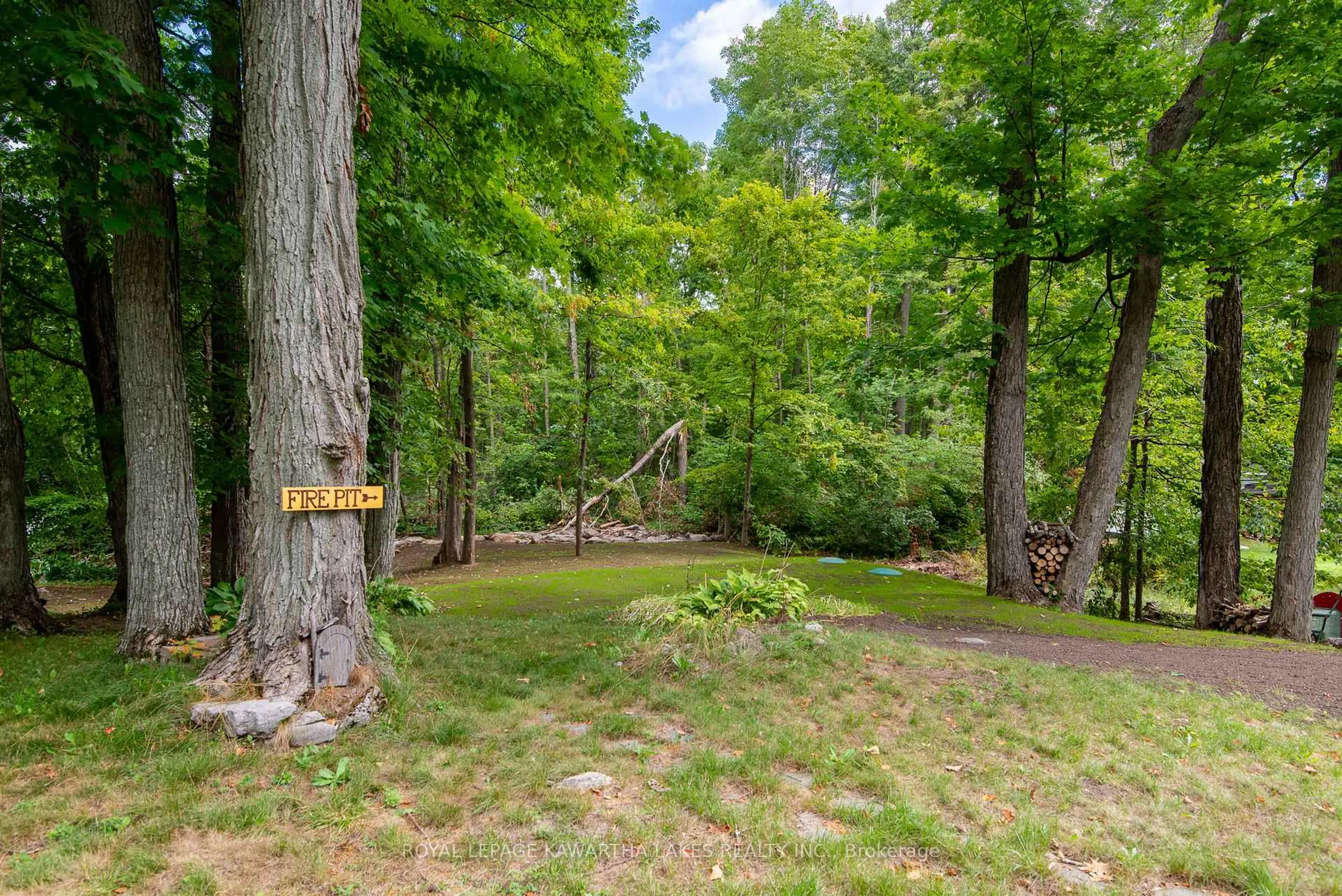 Patio, forest/trees view for 130 Driftwood Village Dr, Kawartha Lakes Ontario K0M 1K0