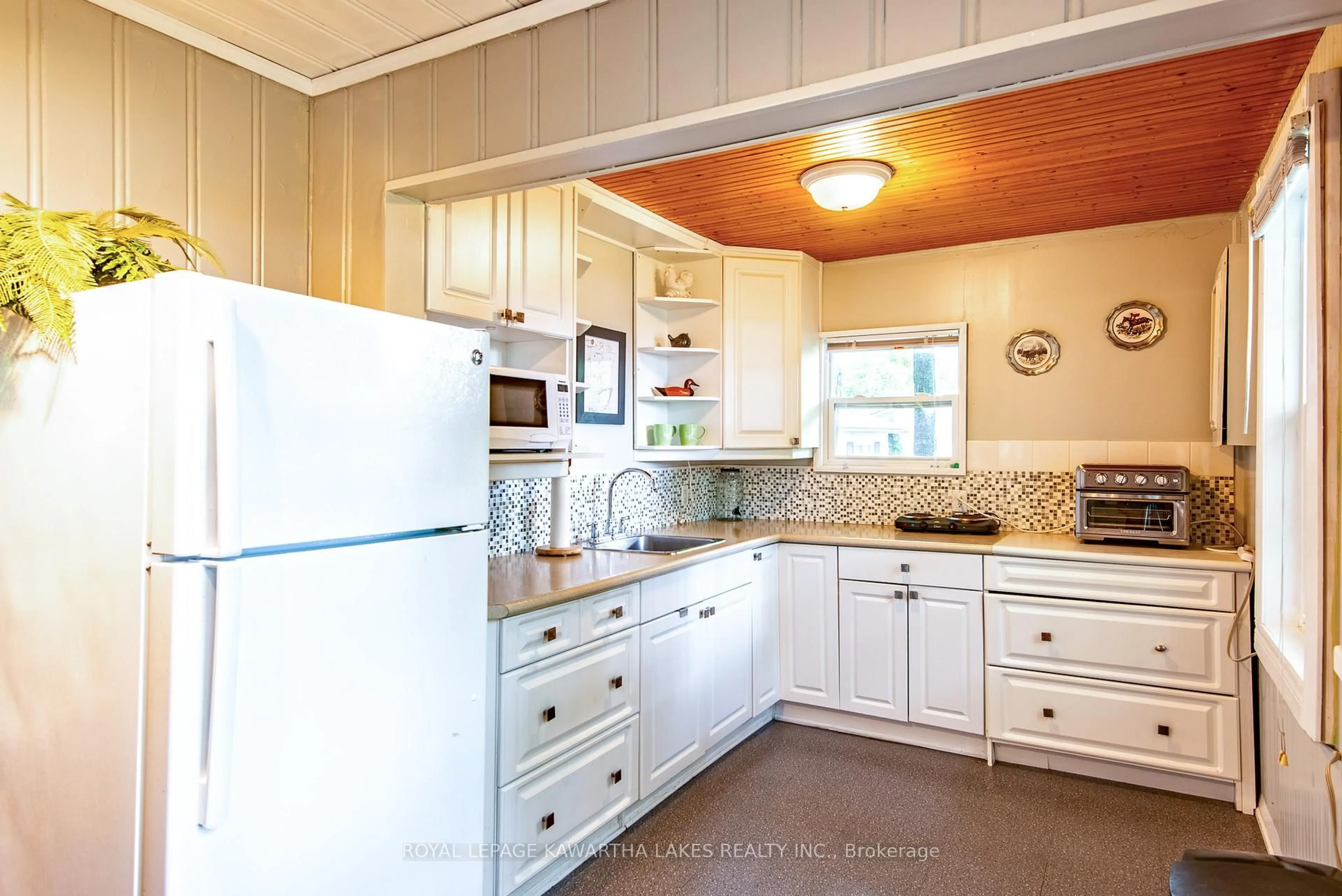 Standard kitchen, ceramic/tile floor for 130 Driftwood Village Dr, Kawartha Lakes Ontario K0M 1K0