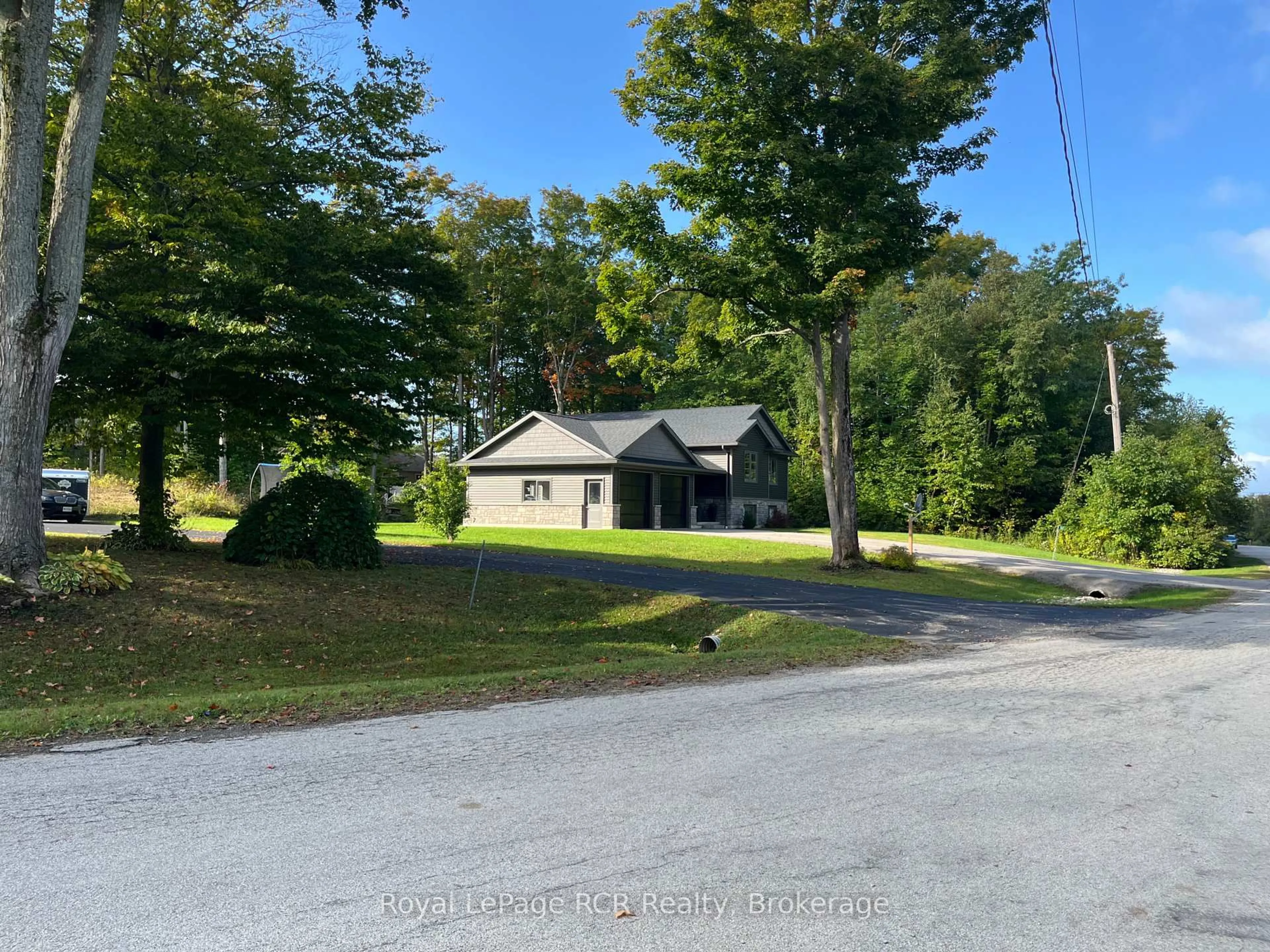 A pic from outside/outdoor area/front of a property/back of a property/a pic from drone, unknown for 52 Birch St, South Bruce Peninsula Ontario N0H 2G0