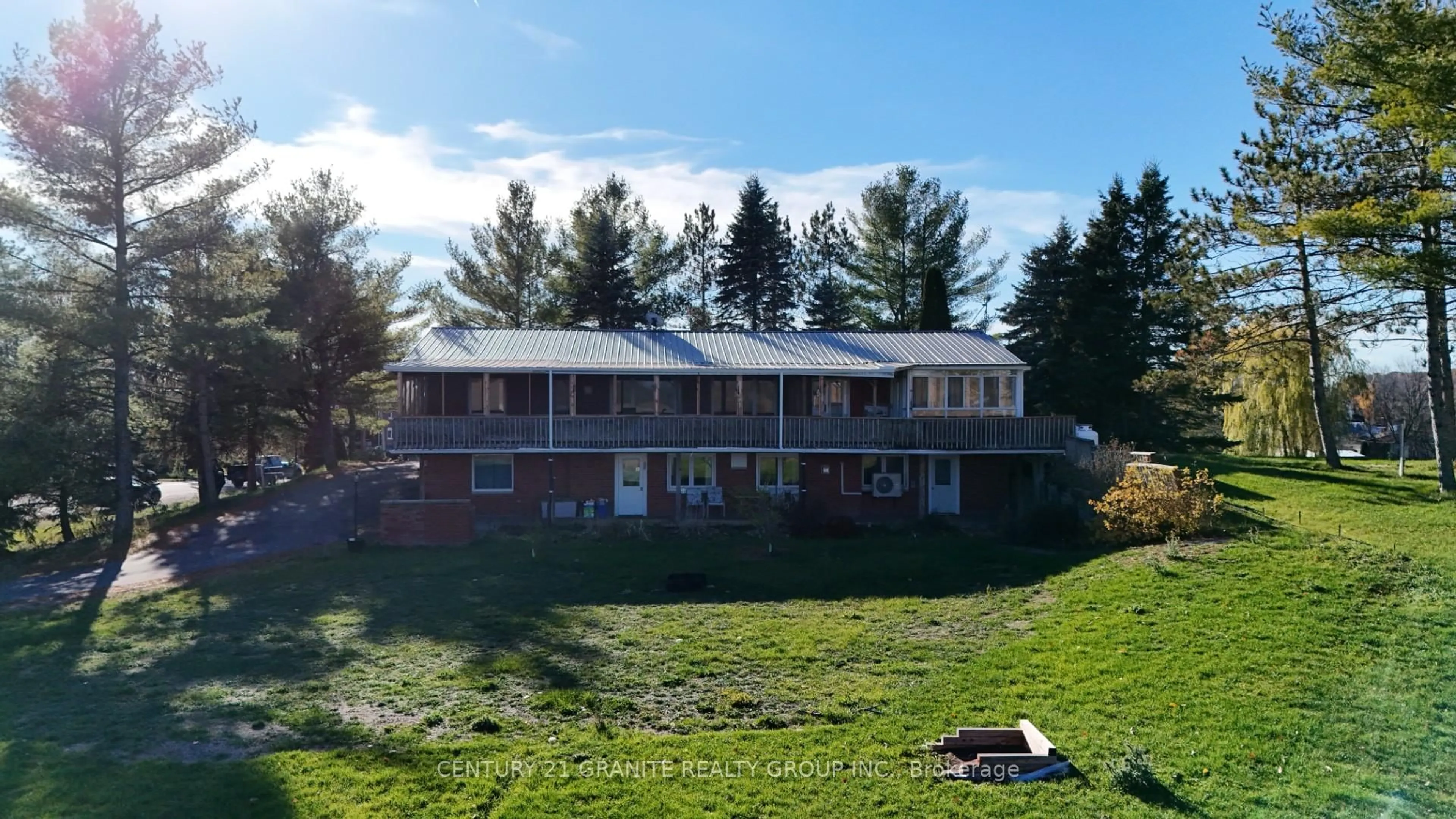 A pic from outside/outdoor area/front of a property/back of a property/a pic from drone, mountain view for 15 East Hungerford Rd, Tweed Ontario K0K 3J0