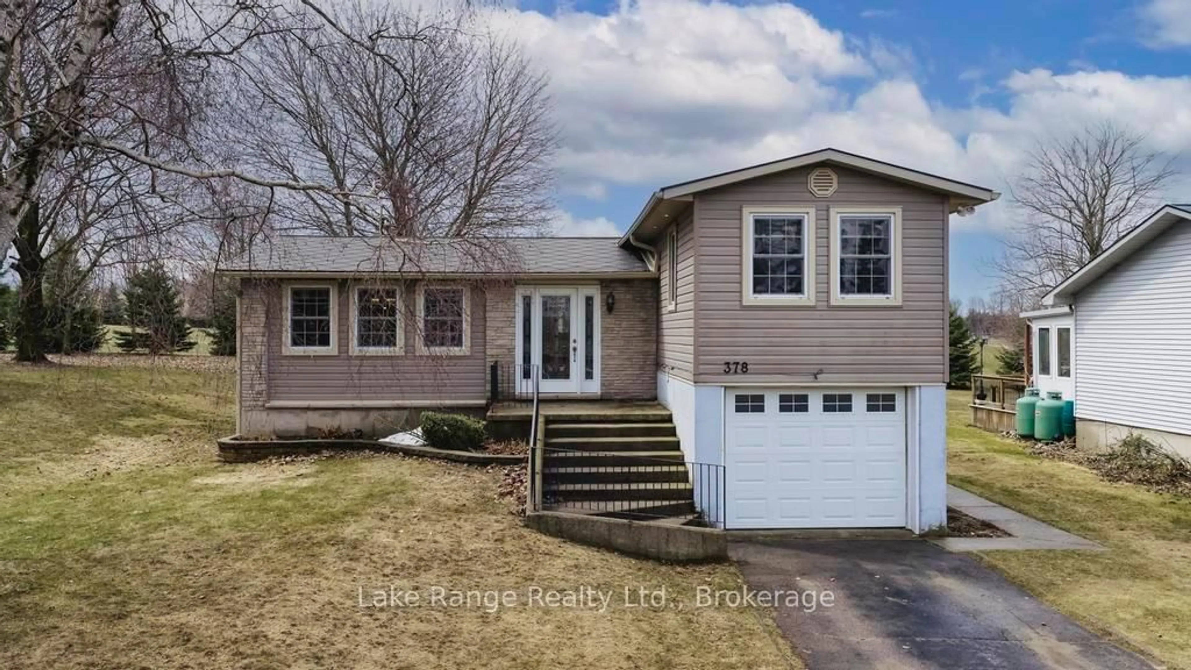 Home with vinyl exterior material, street for 378 South Delhi St, Huron-Kinloss Ontario N0G 2H0