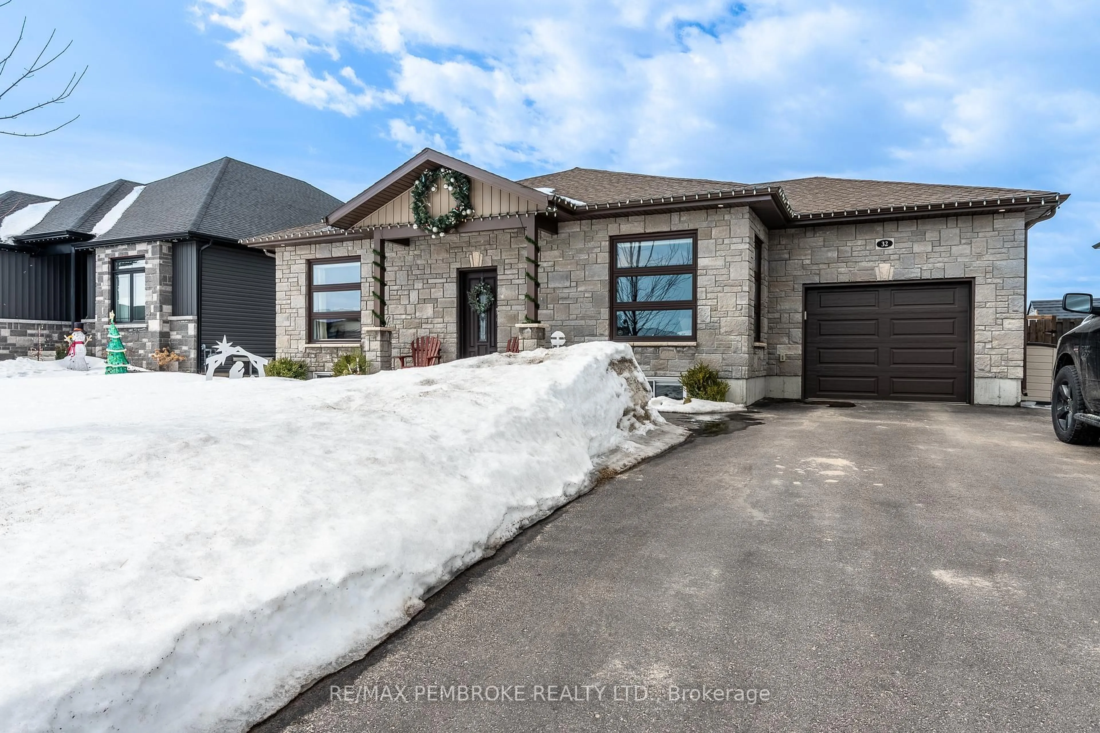 Home with brick exterior material, street for 32 Marquis Dr, Petawawa Ontario K8H 0E5