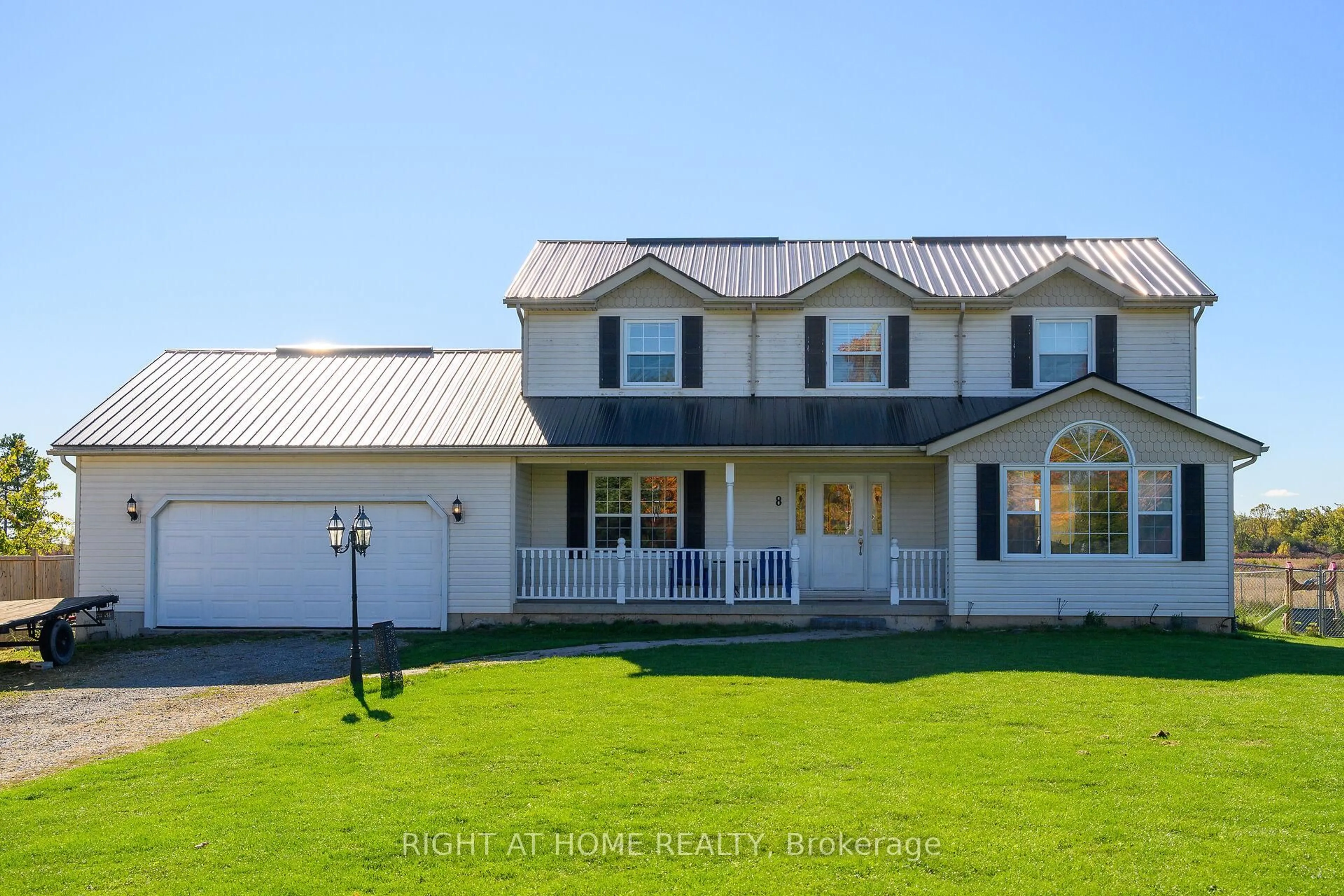 Home with vinyl exterior material, street for 8 Talbot Rd, Haldimand Ontario N0A 1C0