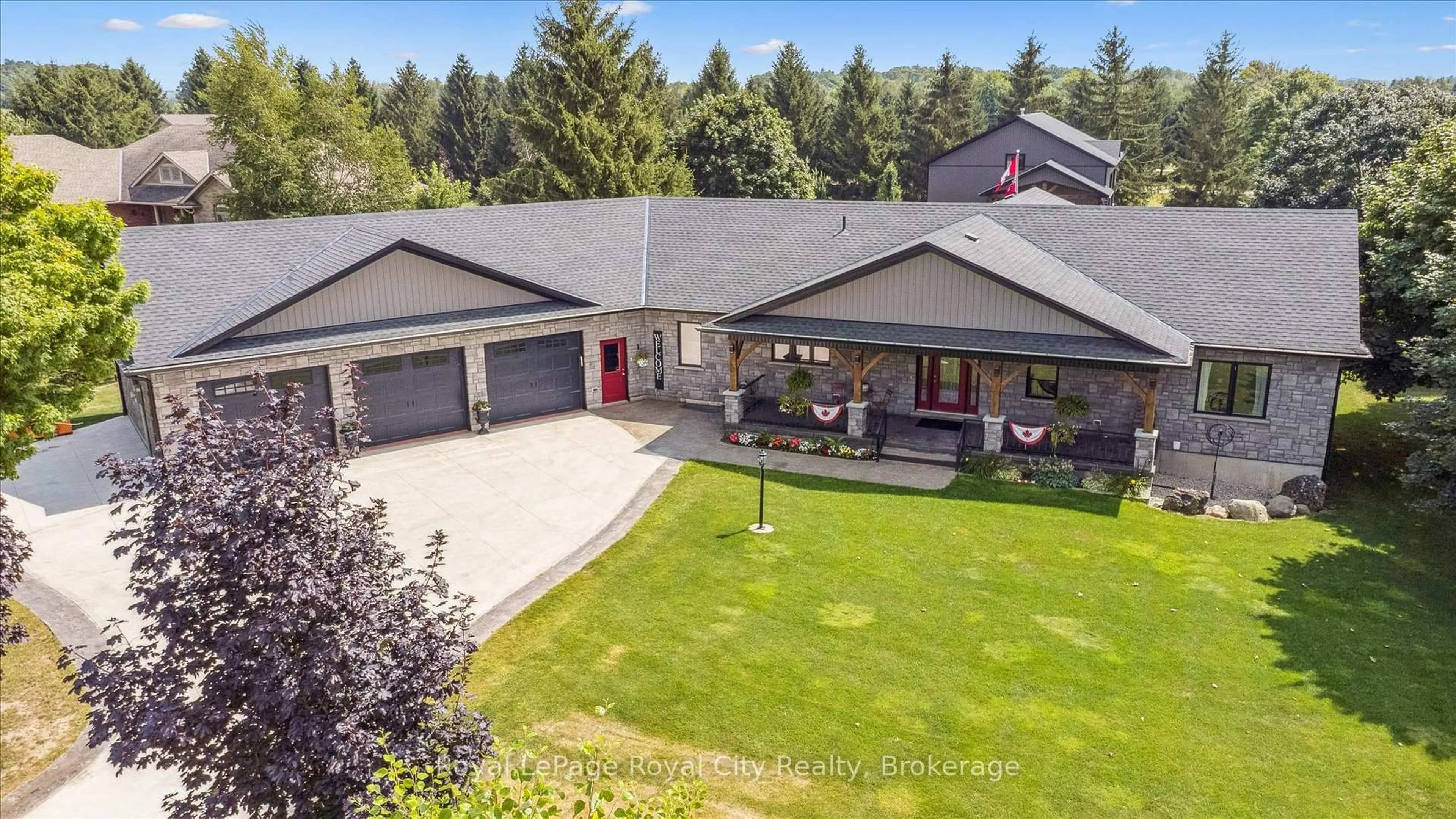 A pic from outside/outdoor area/front of a property/back of a property/a pic from drone, unknown for 100 Harris Cres, Southgate Ontario N0G 2L0