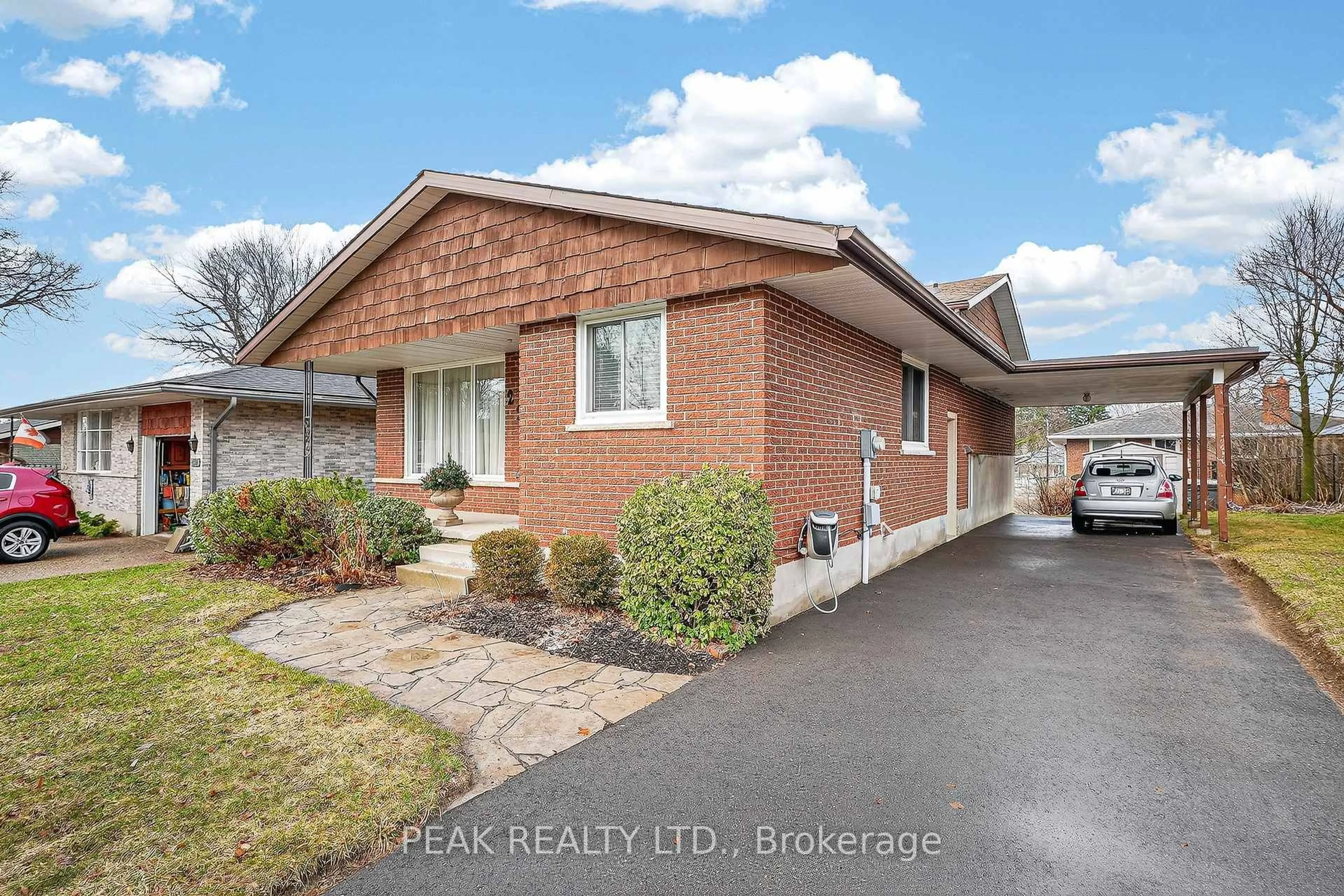 Home with brick exterior material, street for 229 Laurentian Dr, Kitchener Ontario N2E 2G5