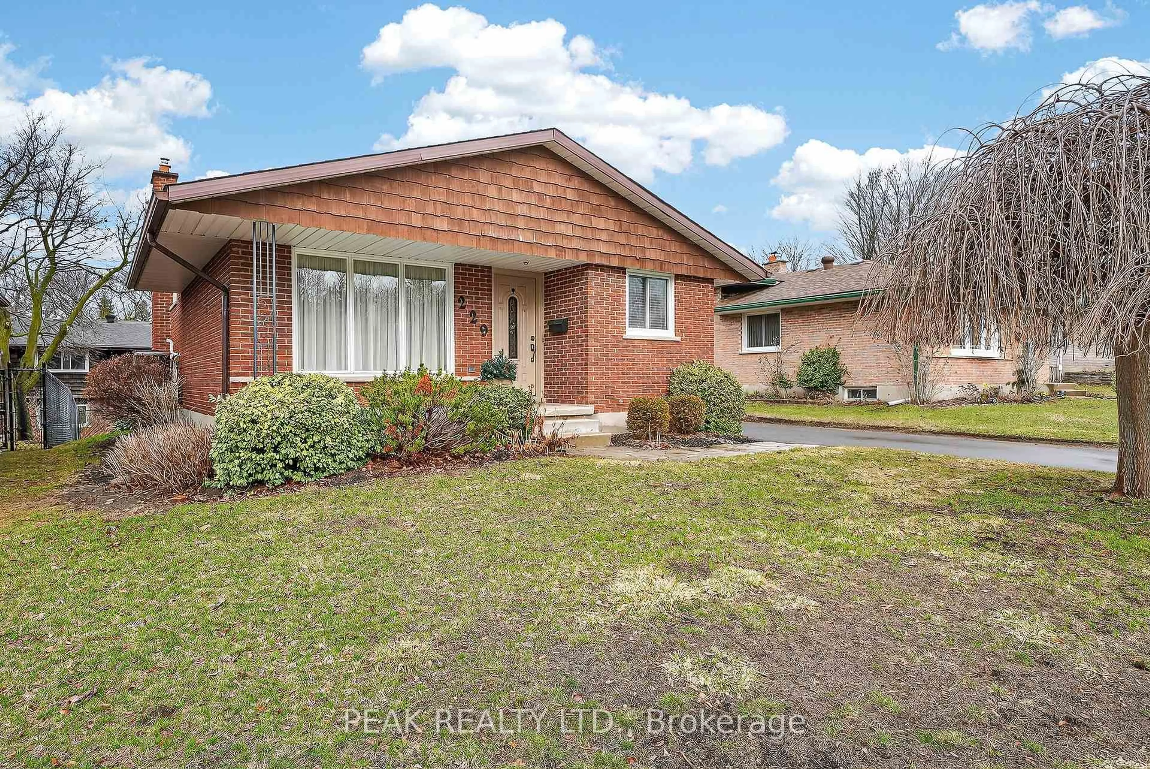 Home with brick exterior material, street for 229 Laurentian Dr, Kitchener Ontario N2E 2G5
