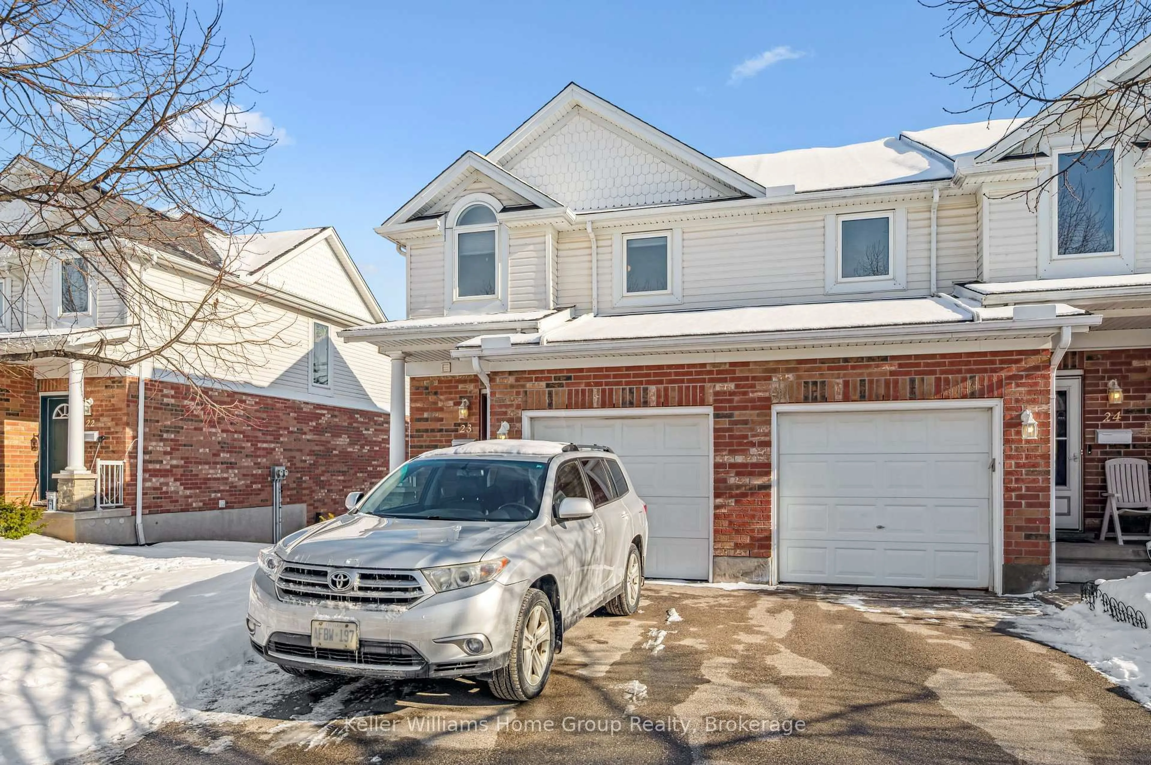 Home with brick exterior material, street for 151 Clairfields Dr #23, Guelph Ontario N1L 1P5