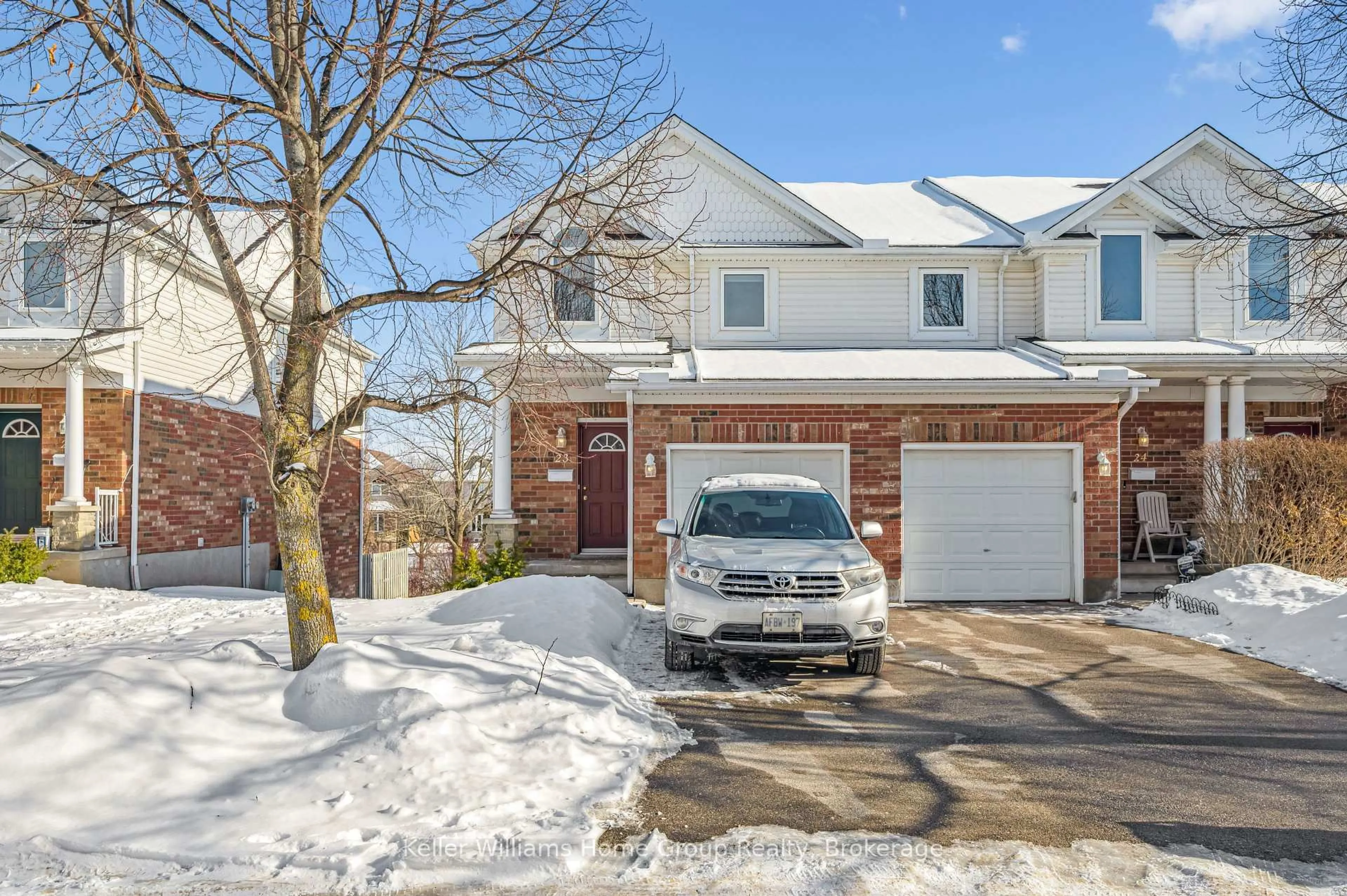 Home with brick exterior material, street for 151 Clairfields Dr #23, Guelph Ontario N1L 1P5