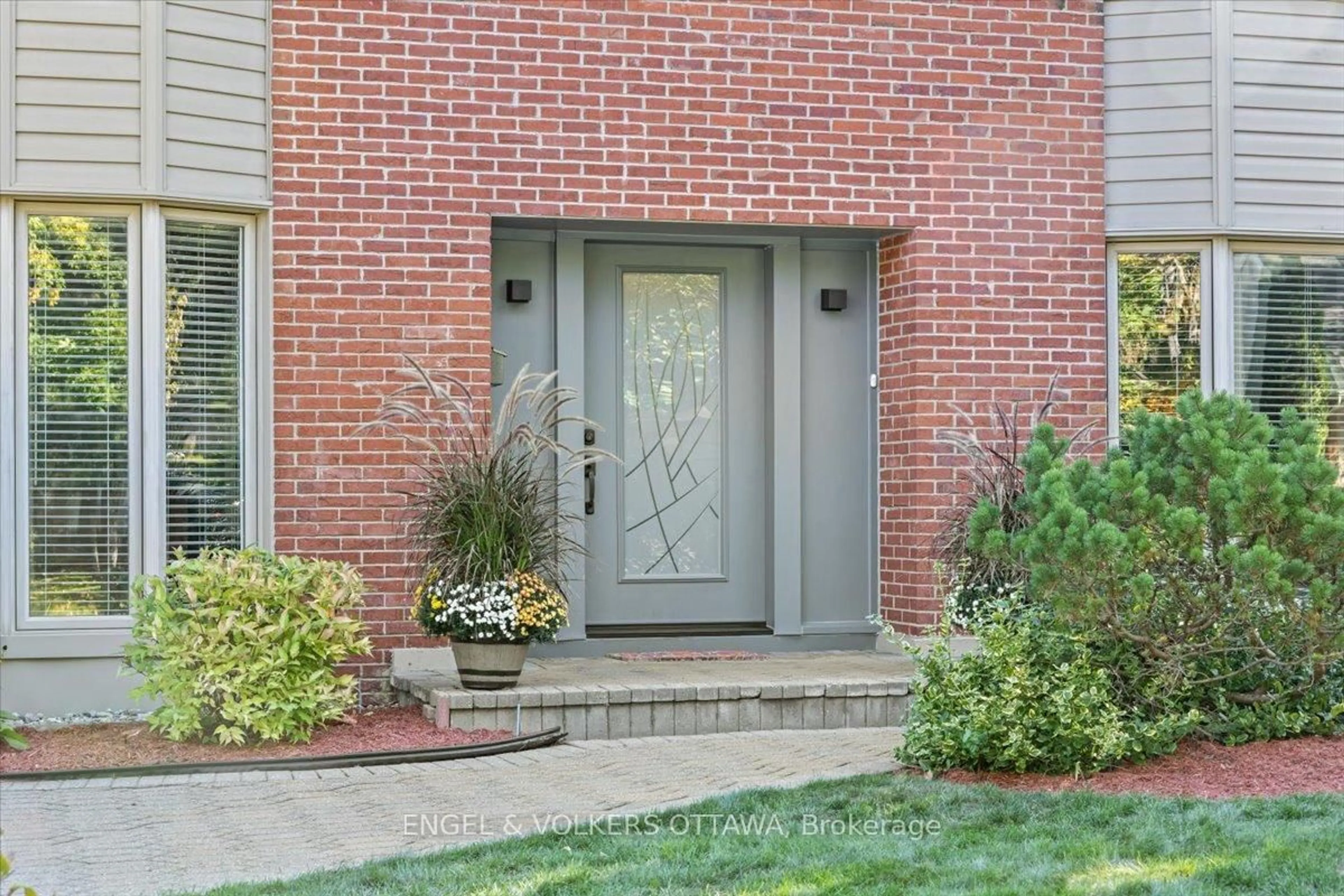 Home with brick exterior material, street for 33 Okanagan Dr, Ottawa Ontario K2H 7E9