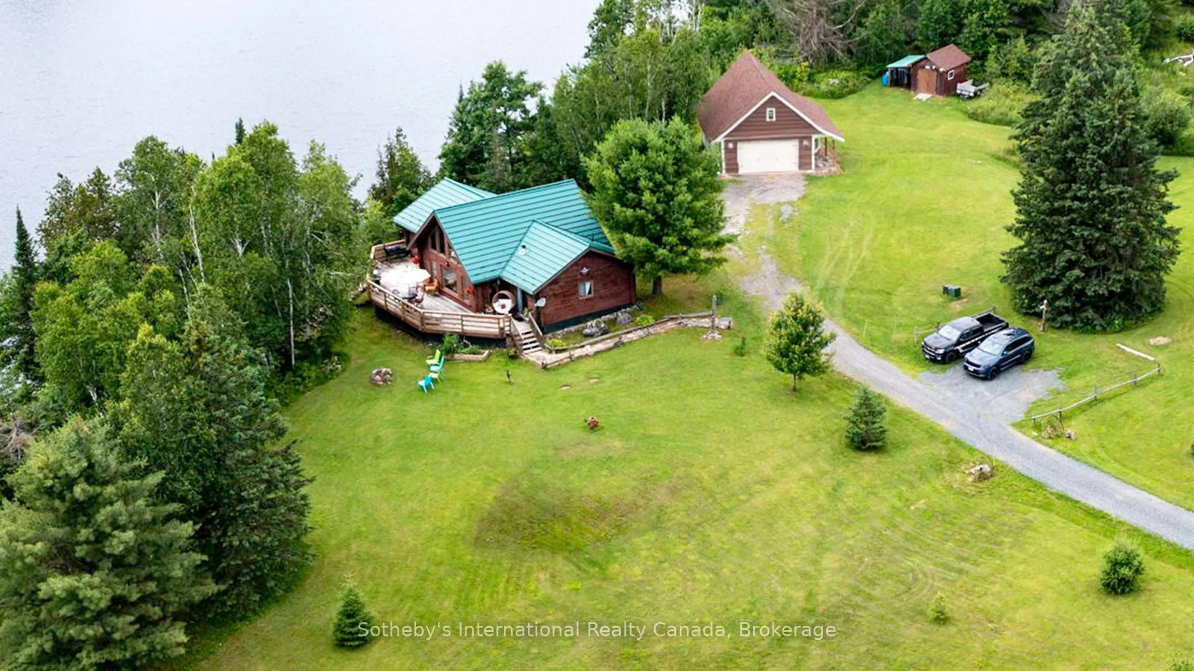 A pic from outside/outdoor area/front of a property/back of a property/a pic from drone, water/lake/river/ocean view for 20 Kodiak Rd, McKellar Ontario P0G 1G0