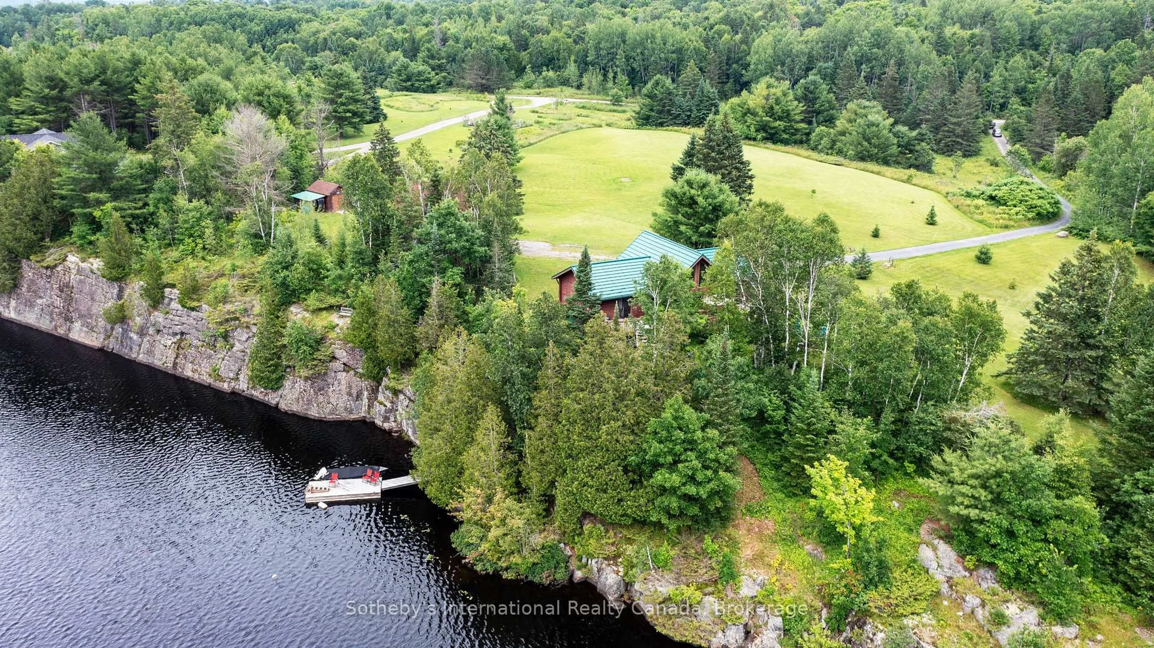 A pic from outside/outdoor area/front of a property/back of a property/a pic from drone, water/lake/river/ocean view for 20 Kodiak Rd, McKellar Ontario P0G 1G0