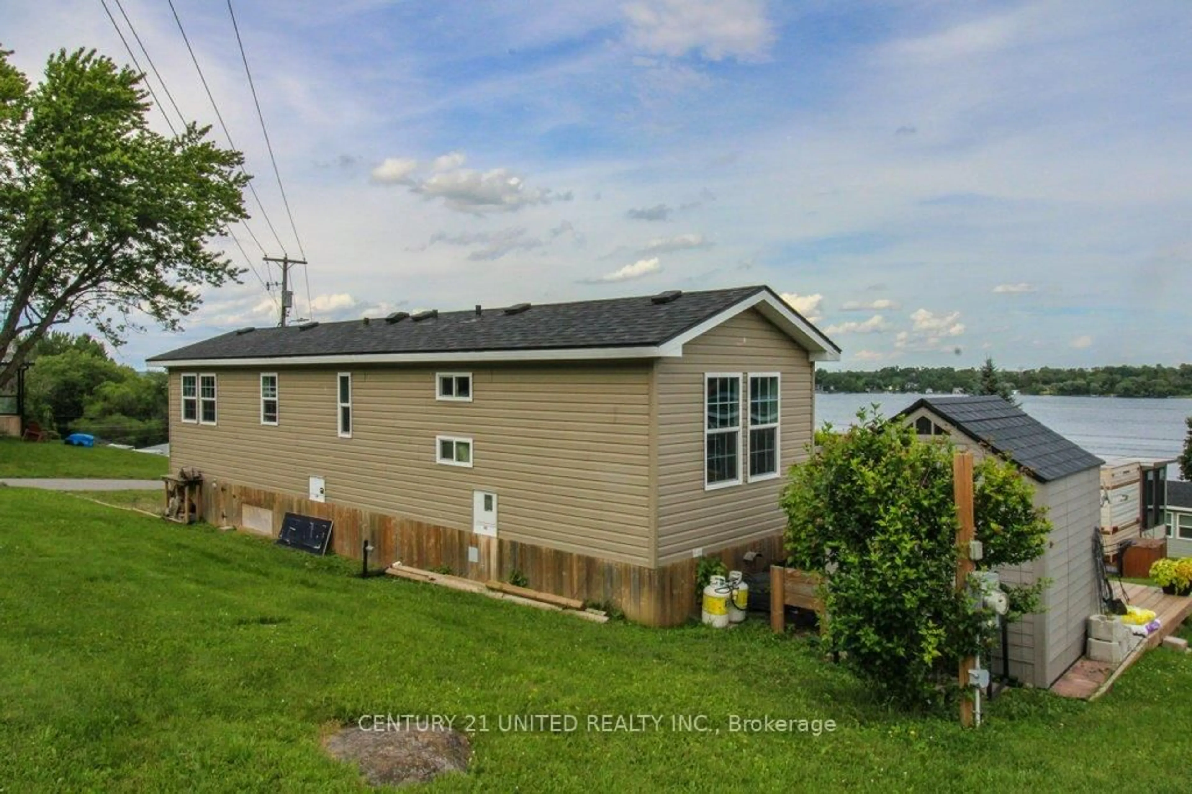 A pic from outside/outdoor area/front of a property/back of a property/a pic from drone, water/lake/river/ocean view for 920 Skyline Rd #5 Marina Cres, Selwyn Ontario K0L 1T0