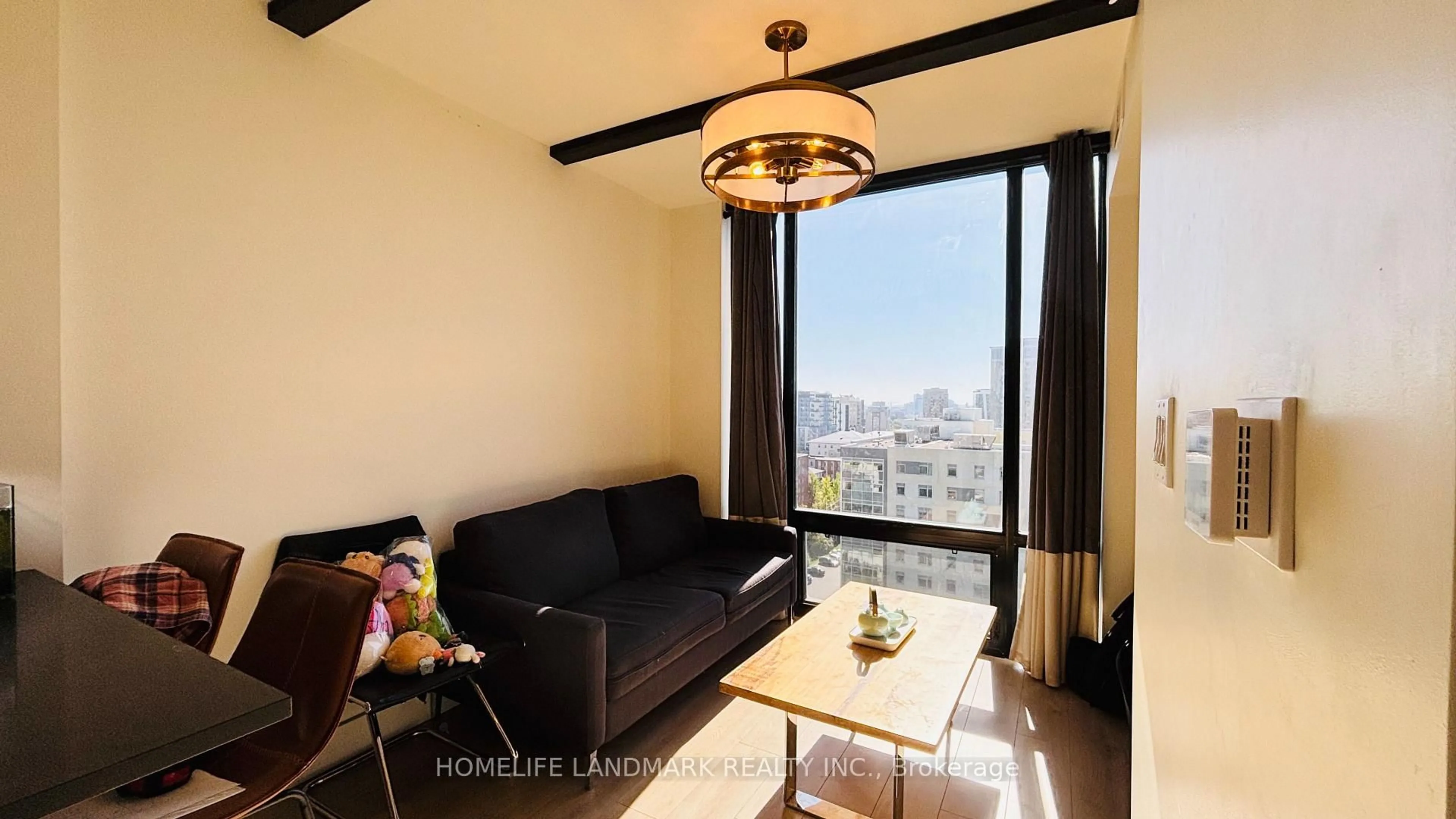 Living room with furniture, wood/laminate floor for 145 Columbia St #1536, Waterloo Ontario N2L 0K7