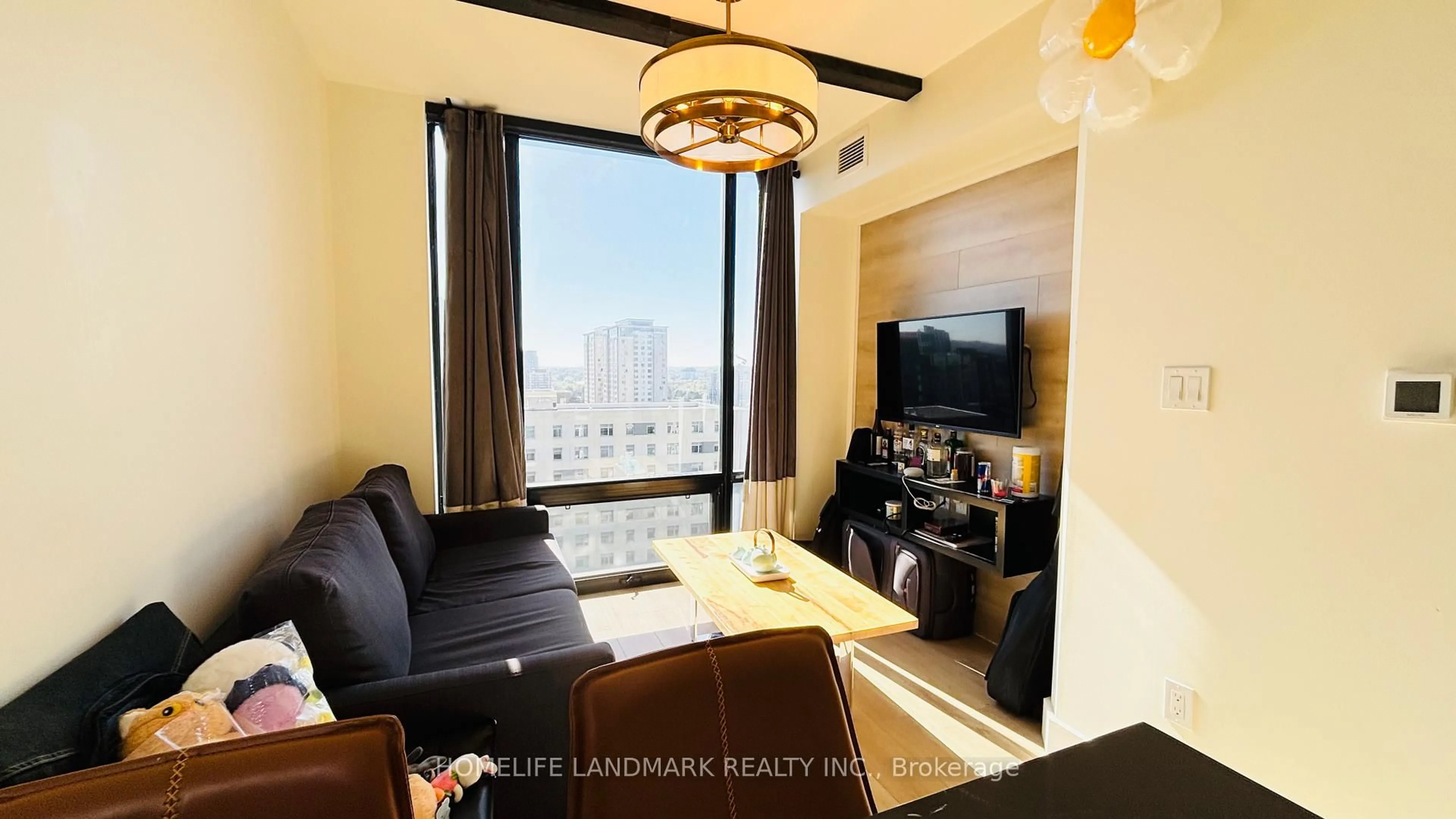 Living room with furniture, wood/laminate floor for 145 Columbia St #1536, Waterloo Ontario N2L 0K7