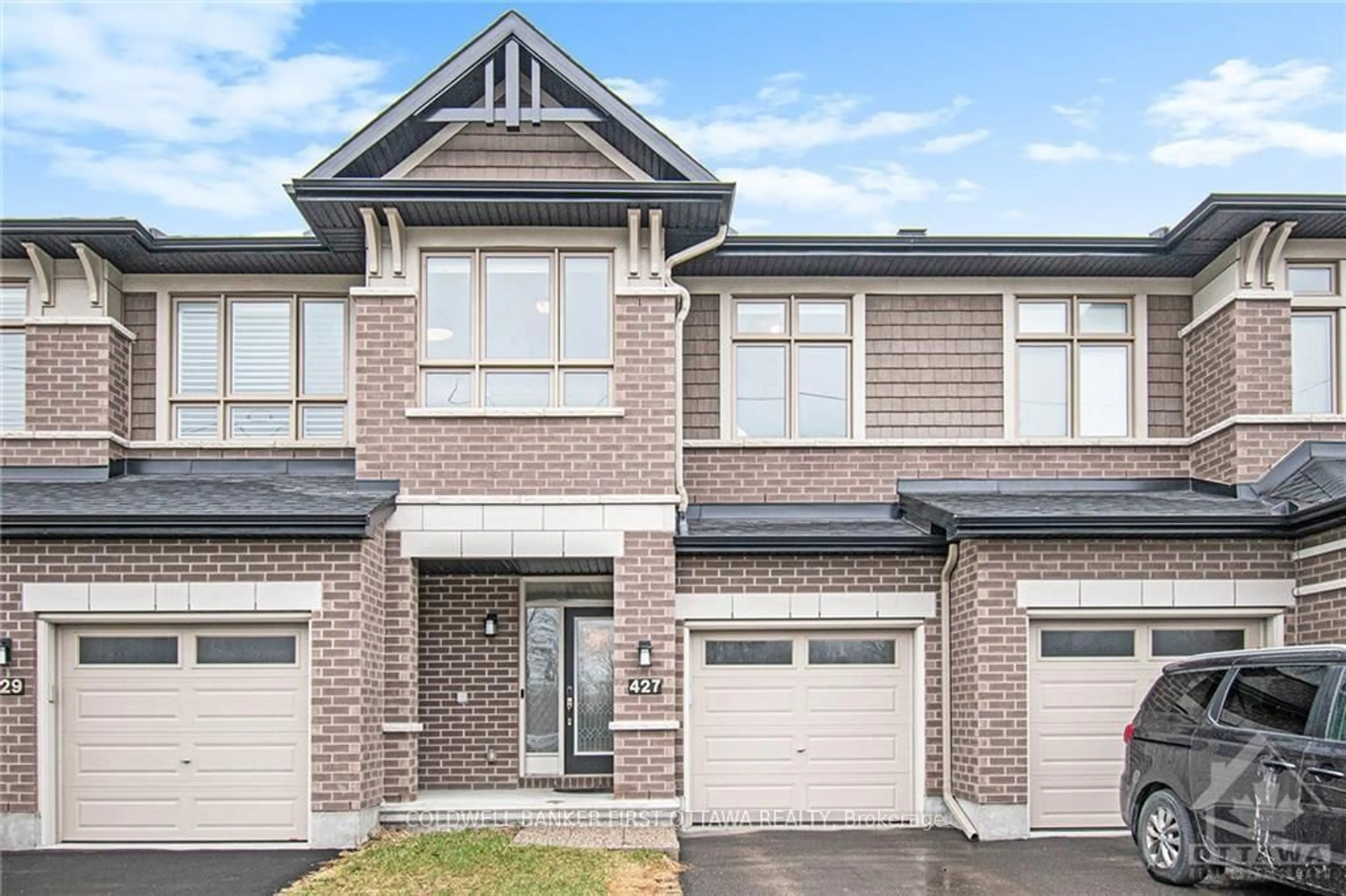 Home with brick exterior material, street for 427 Rainrock Cres, Ottawa Ontario K1W 0K4