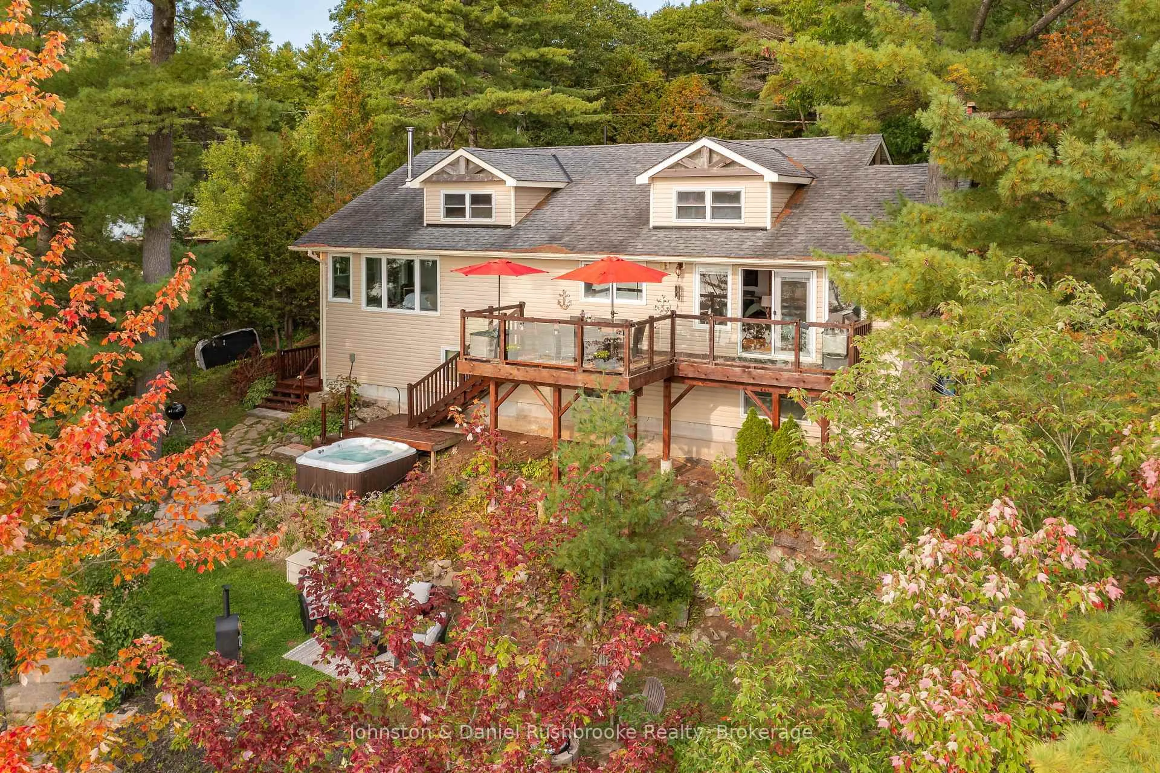 A pic from outside/outdoor area/front of a property/back of a property/a pic from drone, water/lake/river/ocean view for 1051 Evanswood Dr, Gravenhurst Ontario P0E 1G0