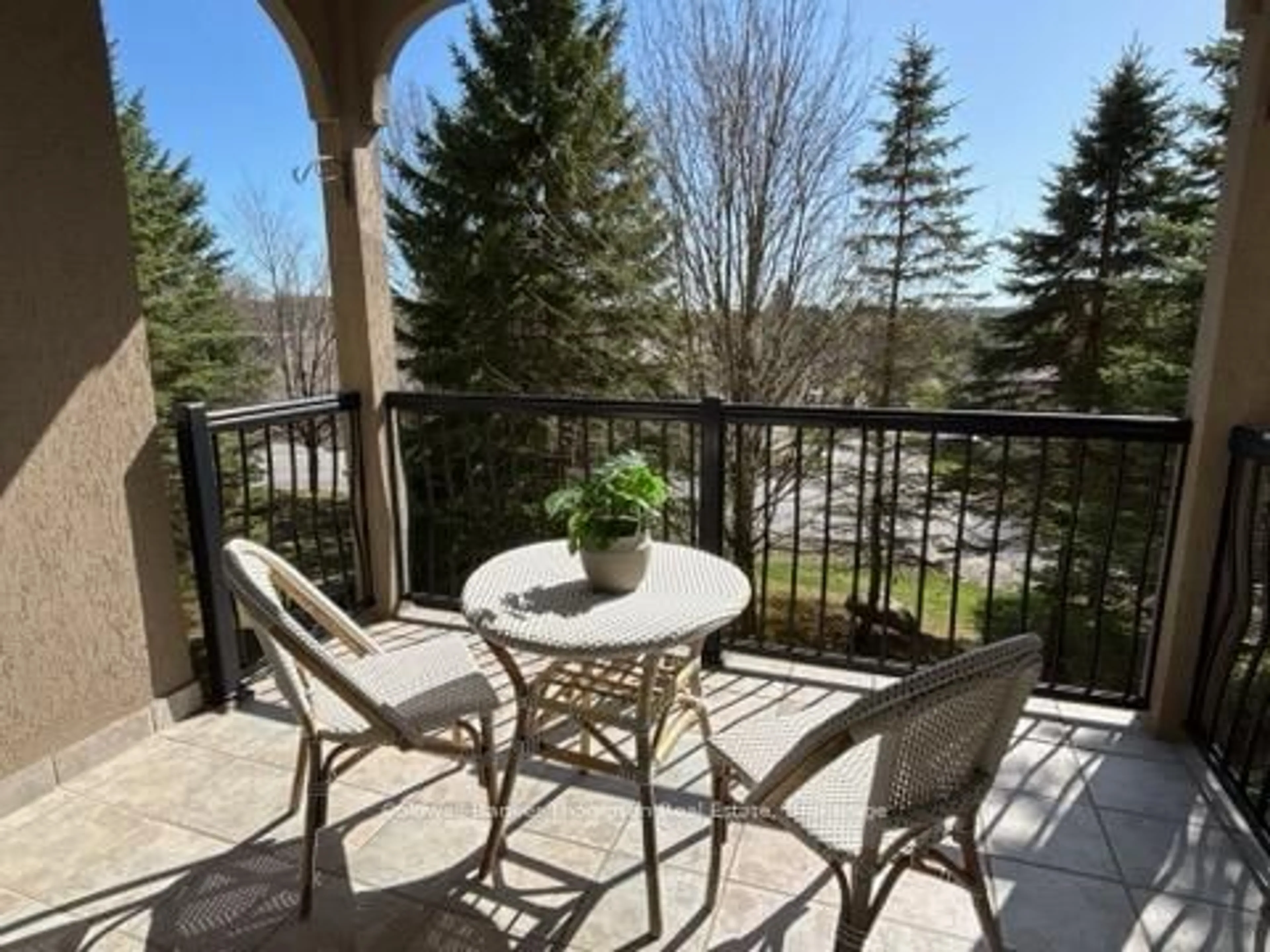 Patio, water/lake/river/ocean view for 4 Legacy Lane #203, Huntsville Ontario P1H 2R2