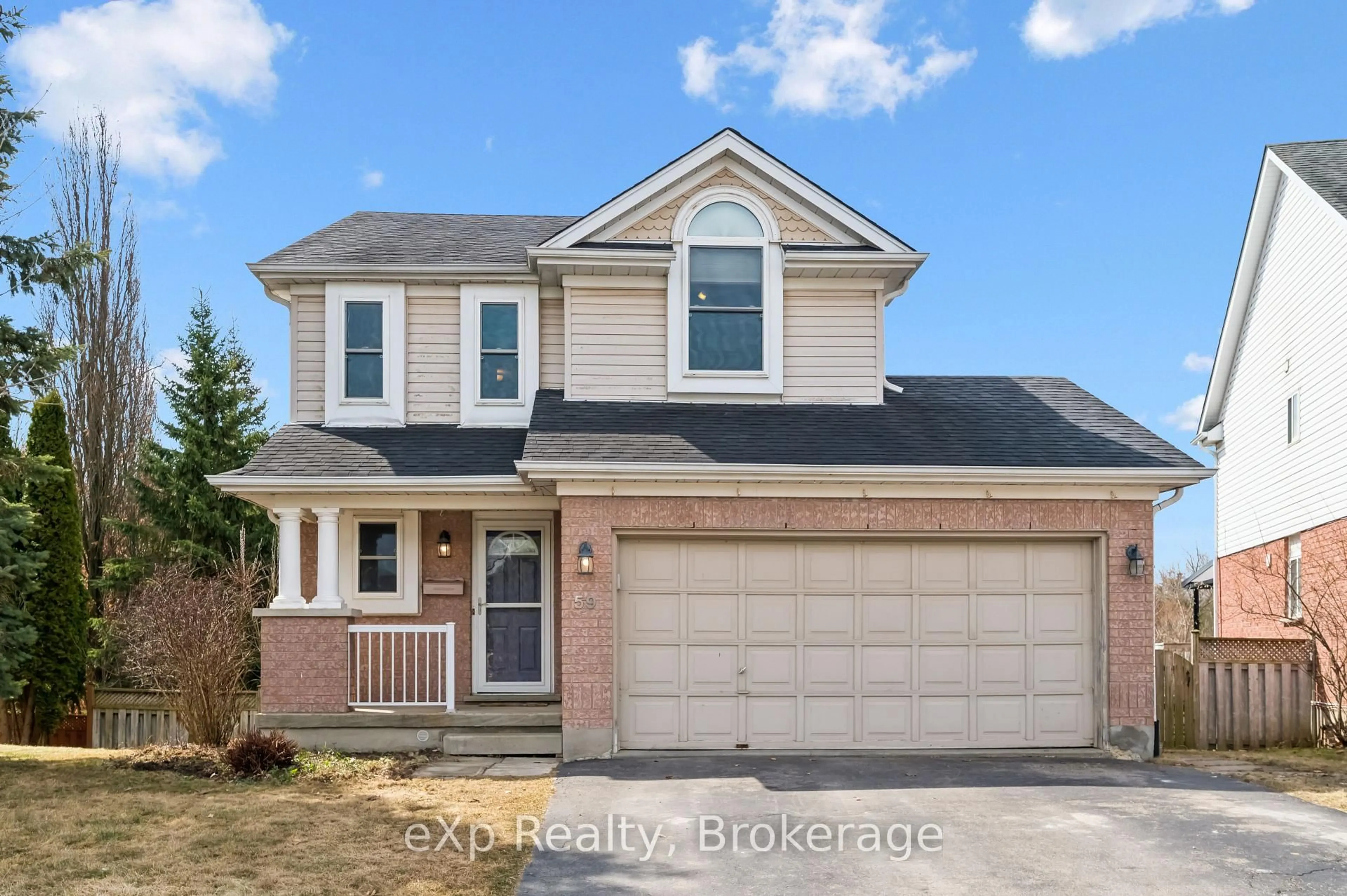 Home with vinyl exterior material, street for 59 Southcreek Tr, Guelph Ontario N1G 4Y9