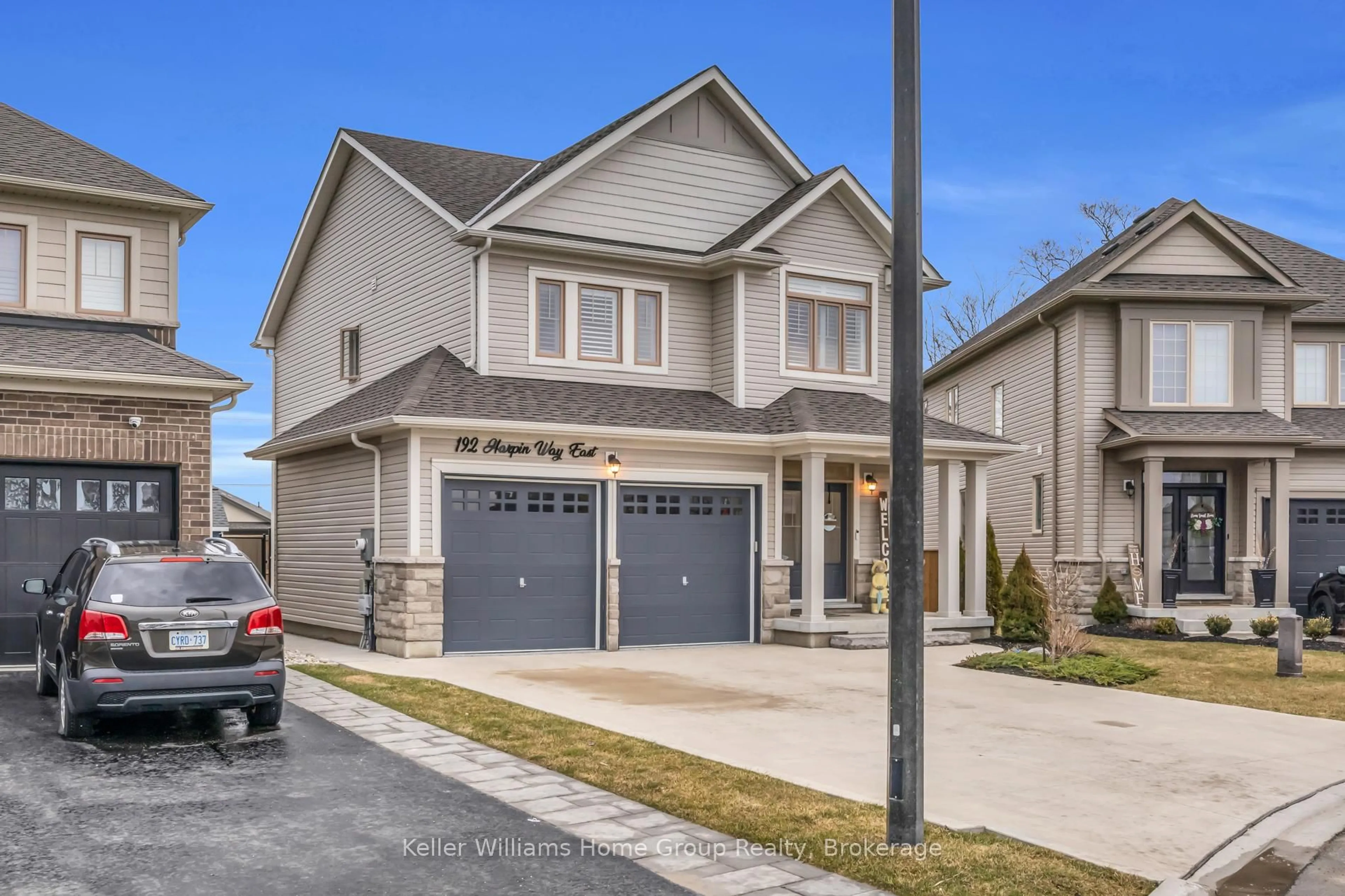 Home with vinyl exterior material, street for 192 Harpin Way, Centre Wellington Ontario N1M 0G8