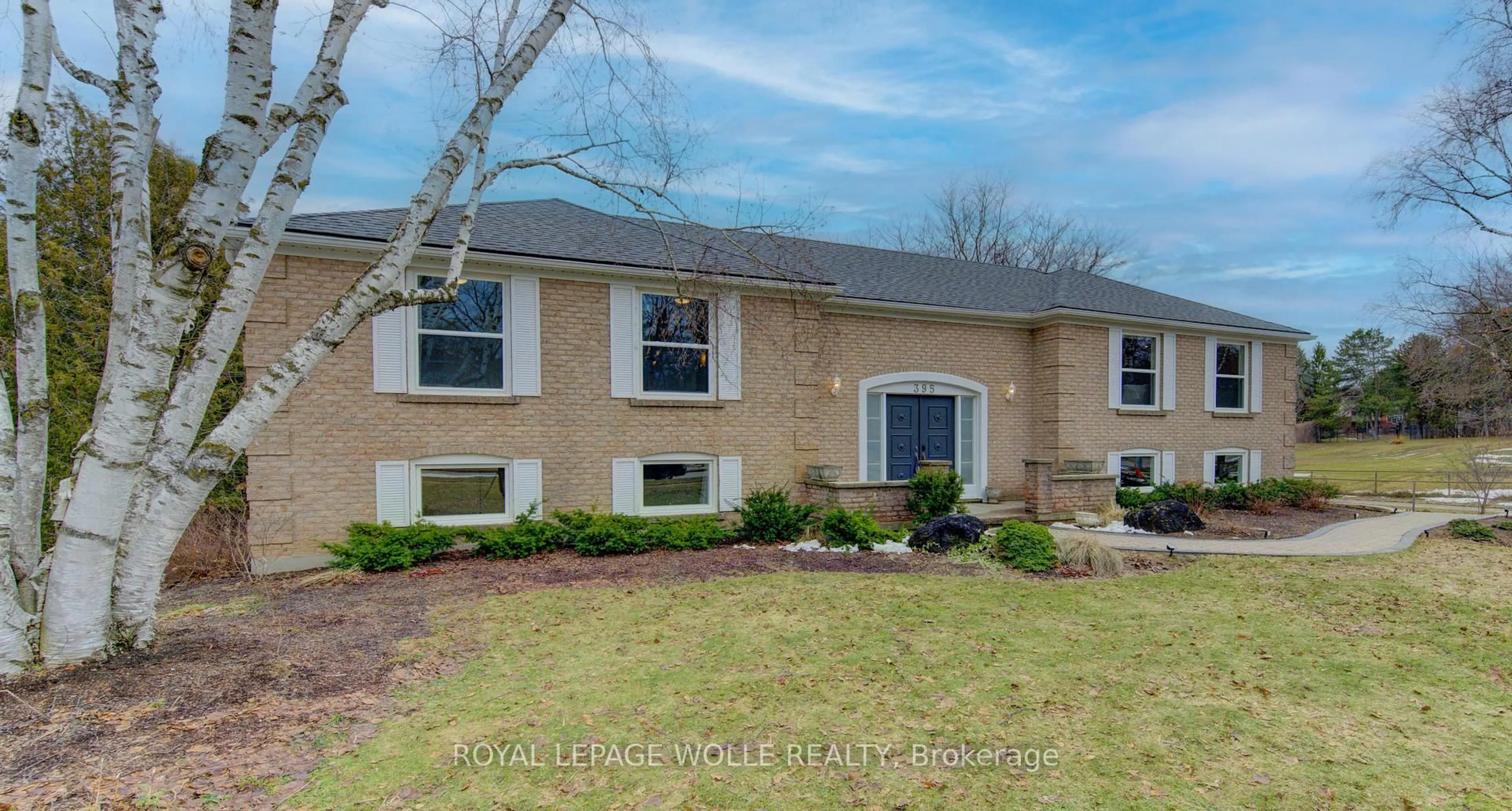 Home with brick exterior material, street for 395 Warrington Dr, Waterloo Ontario N2L 2P7